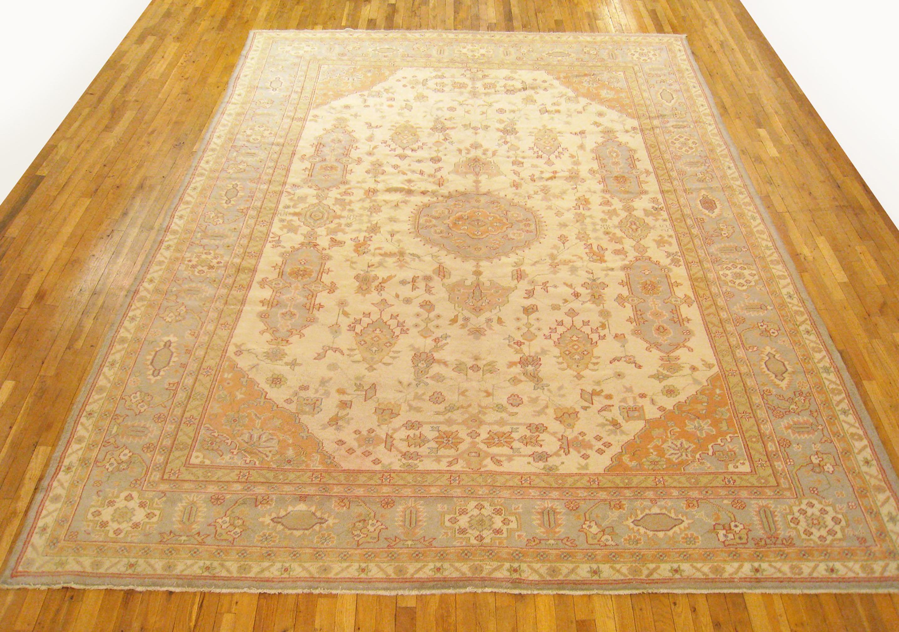 Antique Turkish Oushak decorative oriental carpet, room size, with ivory field.

A gorgeous antique Turkish Oushak carpet, circa 1920, size 13'4