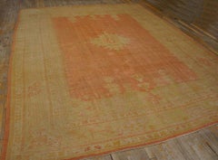 Supreme Peach Color with a Small Detail Medallion Antique Turkish Oushak Rug
