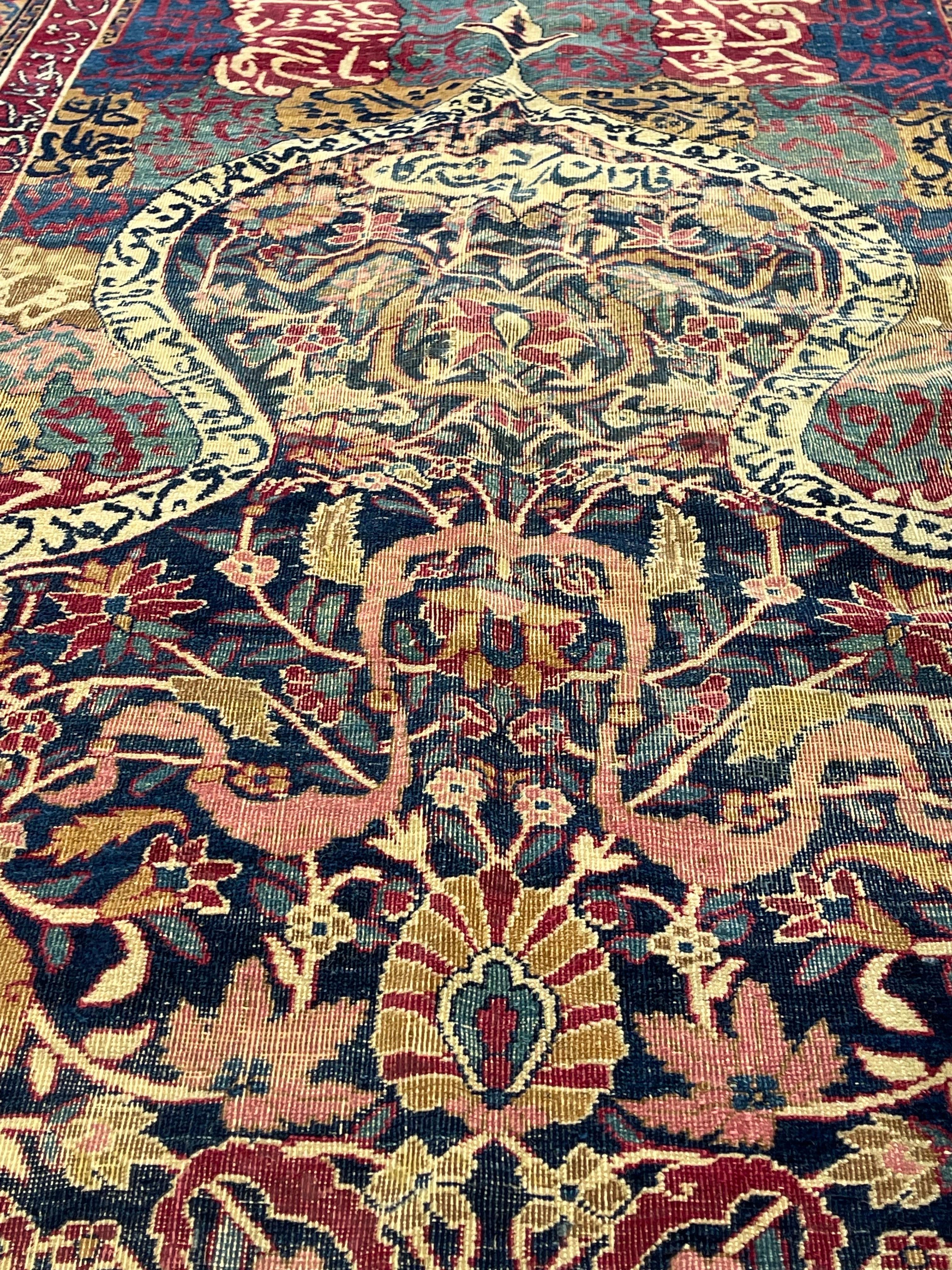The Turkish origin of this carpet remains undisputed. This magnificent example sprung from the most pure Islamic mysticism from the apex of the Mihrab in the shape of the mosque arch hangs the traditional ewer filled with carnations and the design