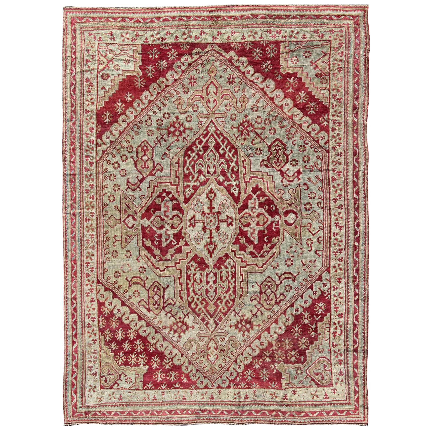 Antique Turkish Ghiordes 19th Century Rug in Raspberry Red, Ice Blue & L. Green For Sale