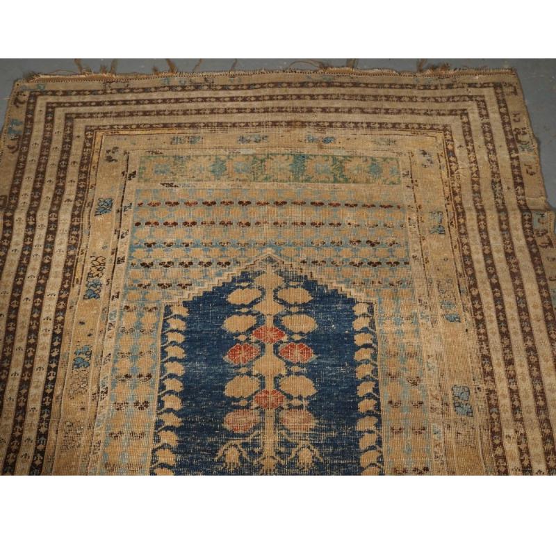 Antique Turkish Ghiordes Prayer Rug of Scarce Early Design, 18th Century In Distressed Condition In Moreton-In-Marsh, GB