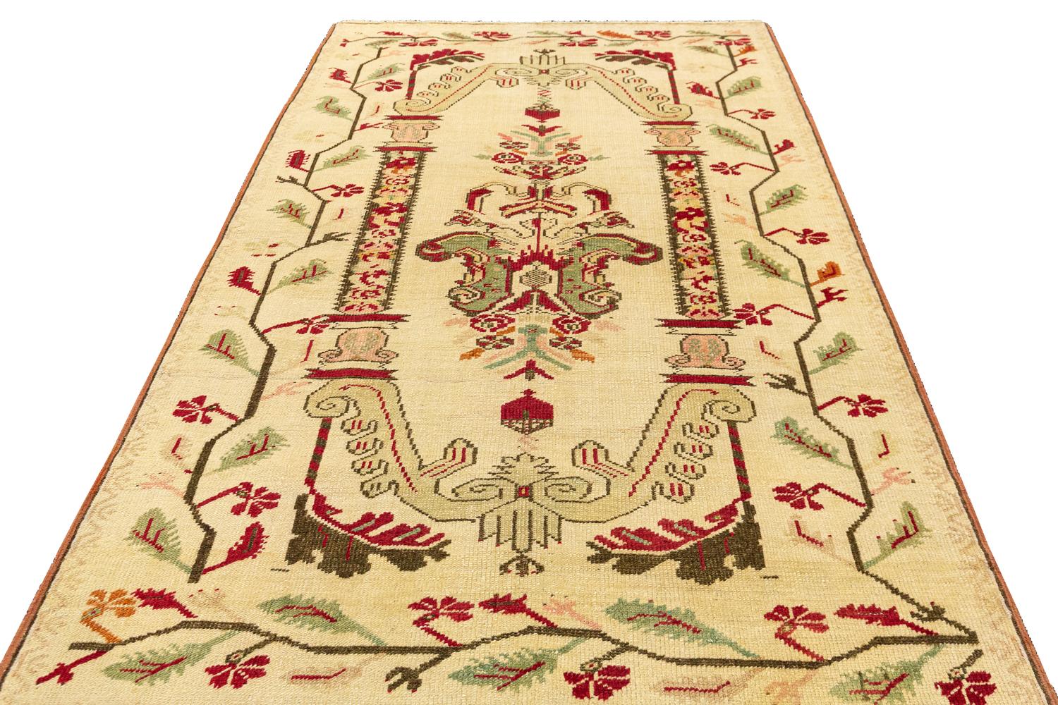 This Antique Turkish Ghiordes Rug is a true work of art. The intricate, hand-woven design is over 100 years old and showcases the talent and artistry of the rug weaver of that era. The wool quality ensures that this rug will be a cherished addition