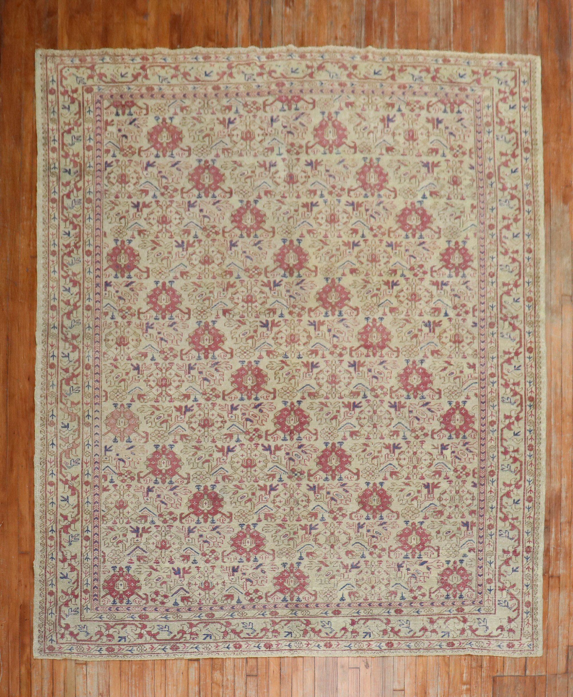 an early 20th century small room size Turkish Ghiordes decorative rug.

Measures: 8'6'' x 10'2''.