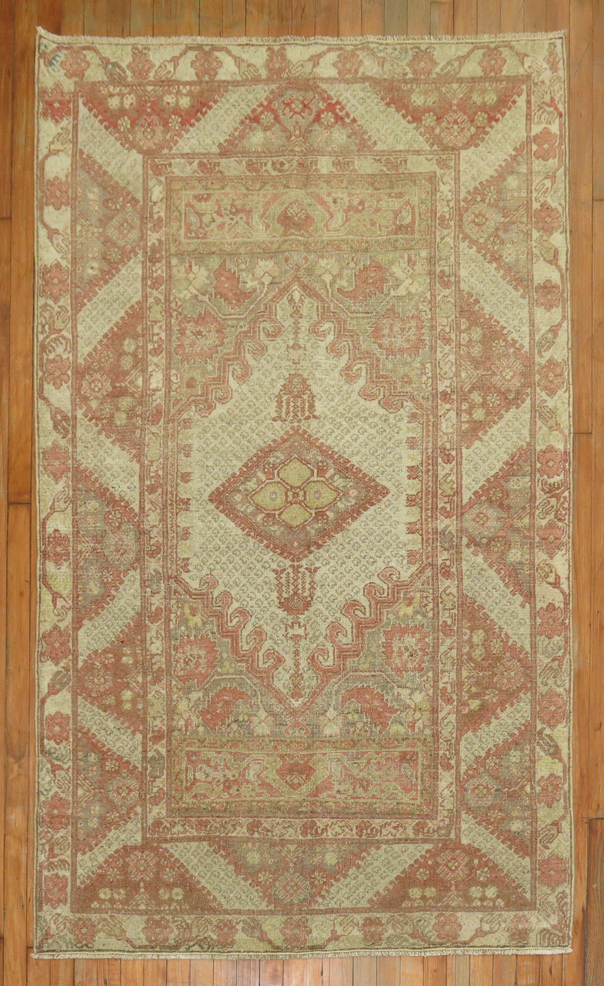 An antique Turkish Ghiordes rug.