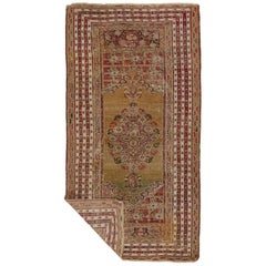 Antique Turkish Ghiordes Rug in Brown with Geometric Medallion - Rug & Kilim
