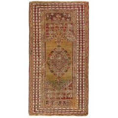 Antique Turkish Ghiordes Rug in Brown with Geometric Medallion - Rug & Kilim