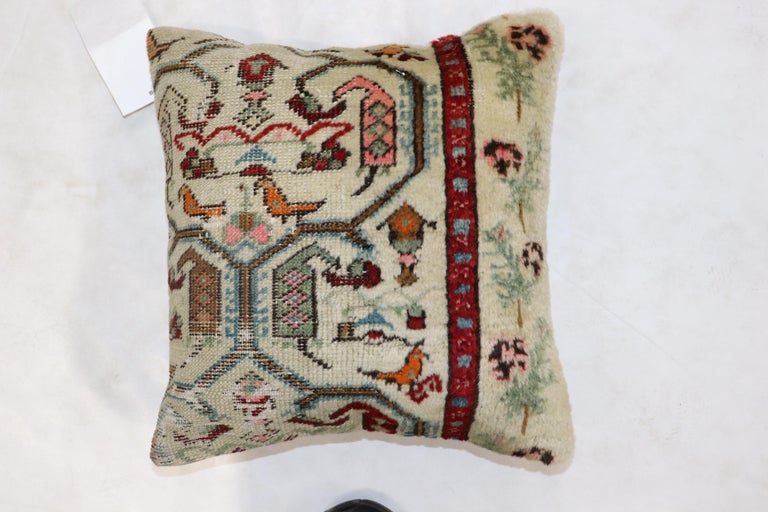 One-of-a-kind rug pillow made from a late 19th-century Turkish ghiordes rug with cotton back and zipper closure. 

Measures: 15