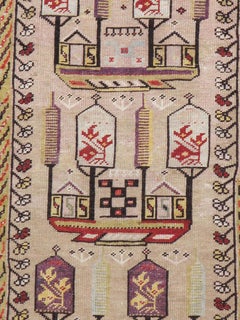 Antique Turkish Ghiordes Small Rug With Shades of Grey-Blue, Purple, and Beige