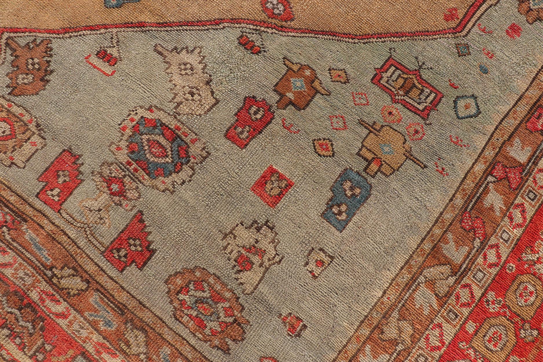 Antique Turkish Ghoirdes Oushak Rug With Medallion in Sky Blue, Tan, and Red For Sale 12