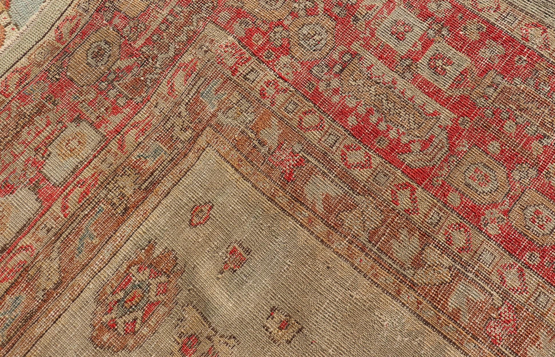 Antique Turkish Ghoirdes Oushak Rug With Medallion in Sky Blue, Tan, and Red In Good Condition For Sale In Atlanta, GA