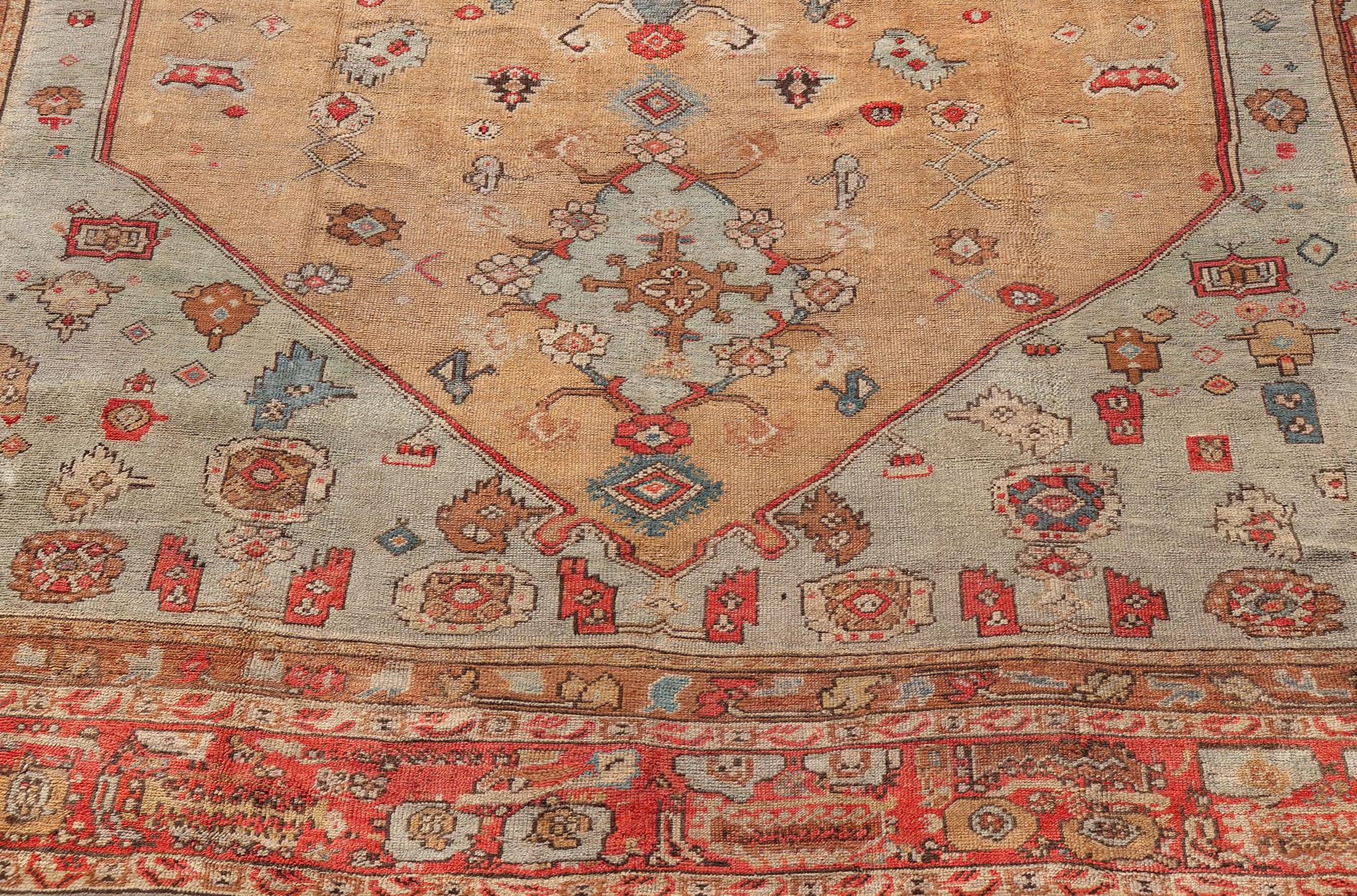 Antique Turkish Ghoirdes Oushak Rug With Medallion in Sky Blue, Tan, and Red For Sale 2