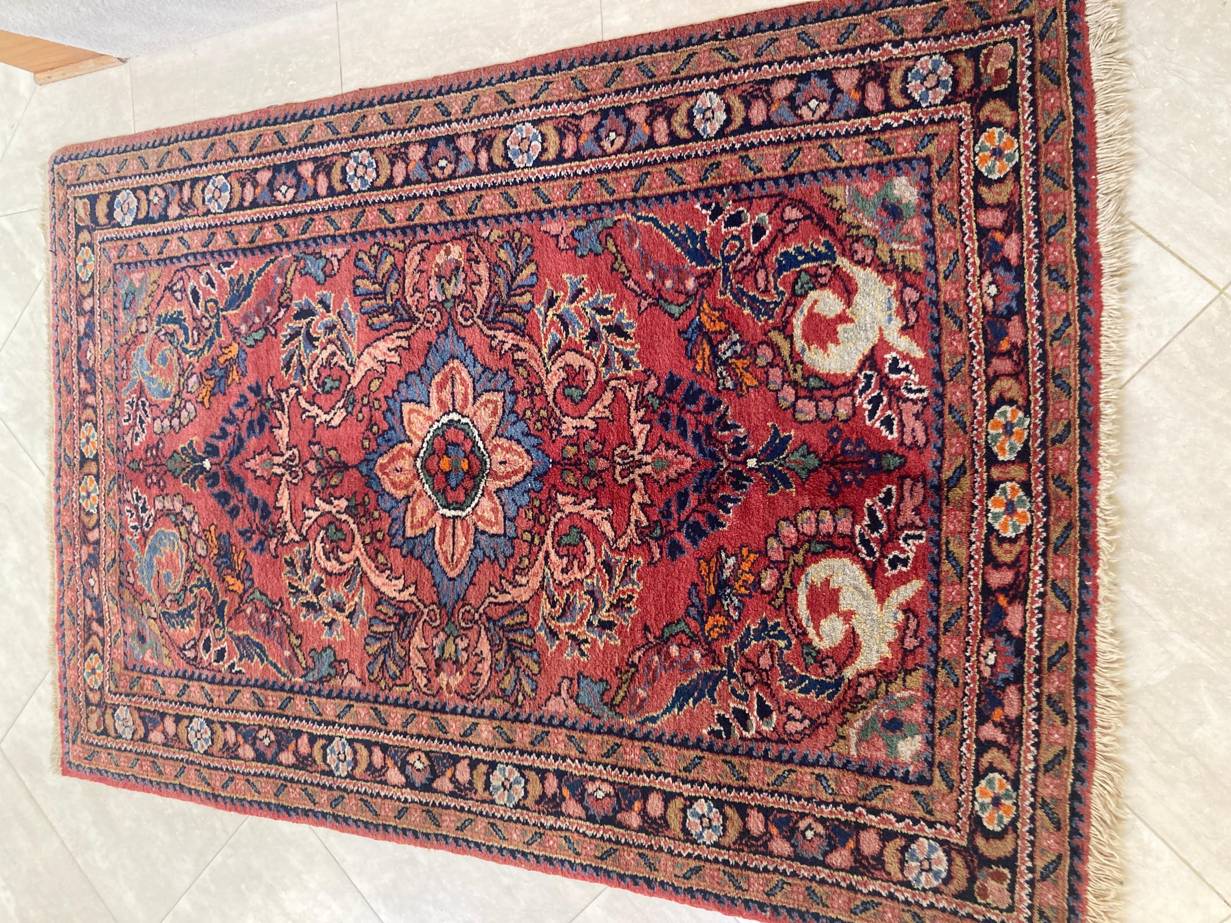 Small hand-knotted rug from Eastern Turkey,
Antique oriental accent rug, carpet or mat.
Vintage Turkish rug with rare colors. 
This hand-knotted rug has an unusual green field with blue and red traditional motives.
The rug is completely made of