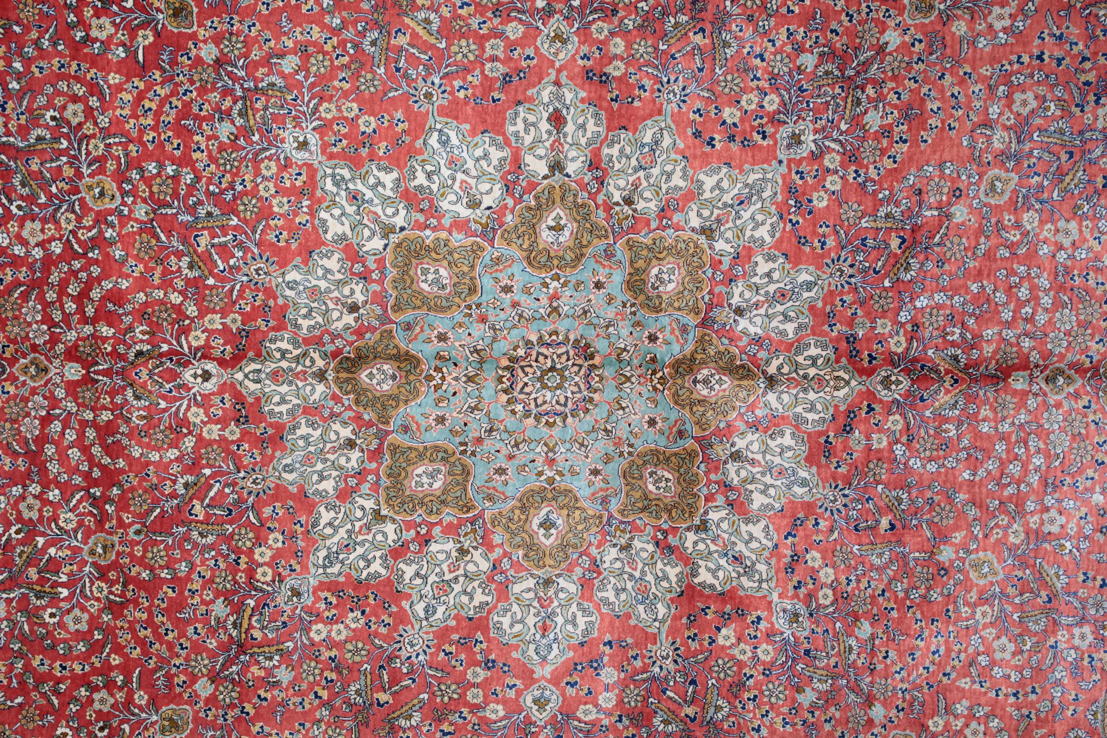 Vintage handmade carpet Turkish rugs are considered by many to be one of the most beautiful handmade carpets in the world. This elegant Orange rug has a very nice palette of colours such as rust, light blue, navy, beige, gold and orange-pink. The
