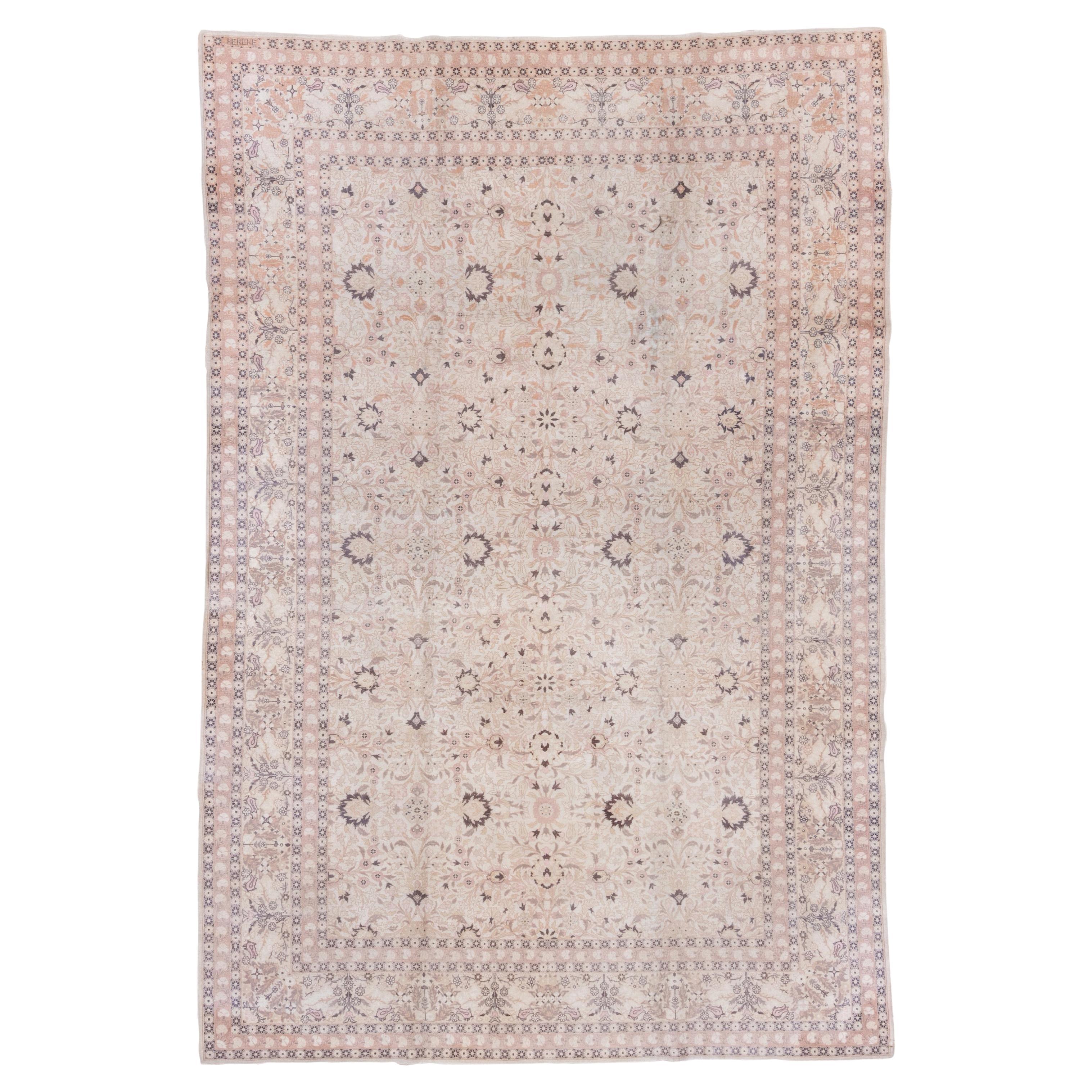 Antique Turkish Hereke Rug, Ivory Field, Pink & Navy Accents, circa 1930s For Sale