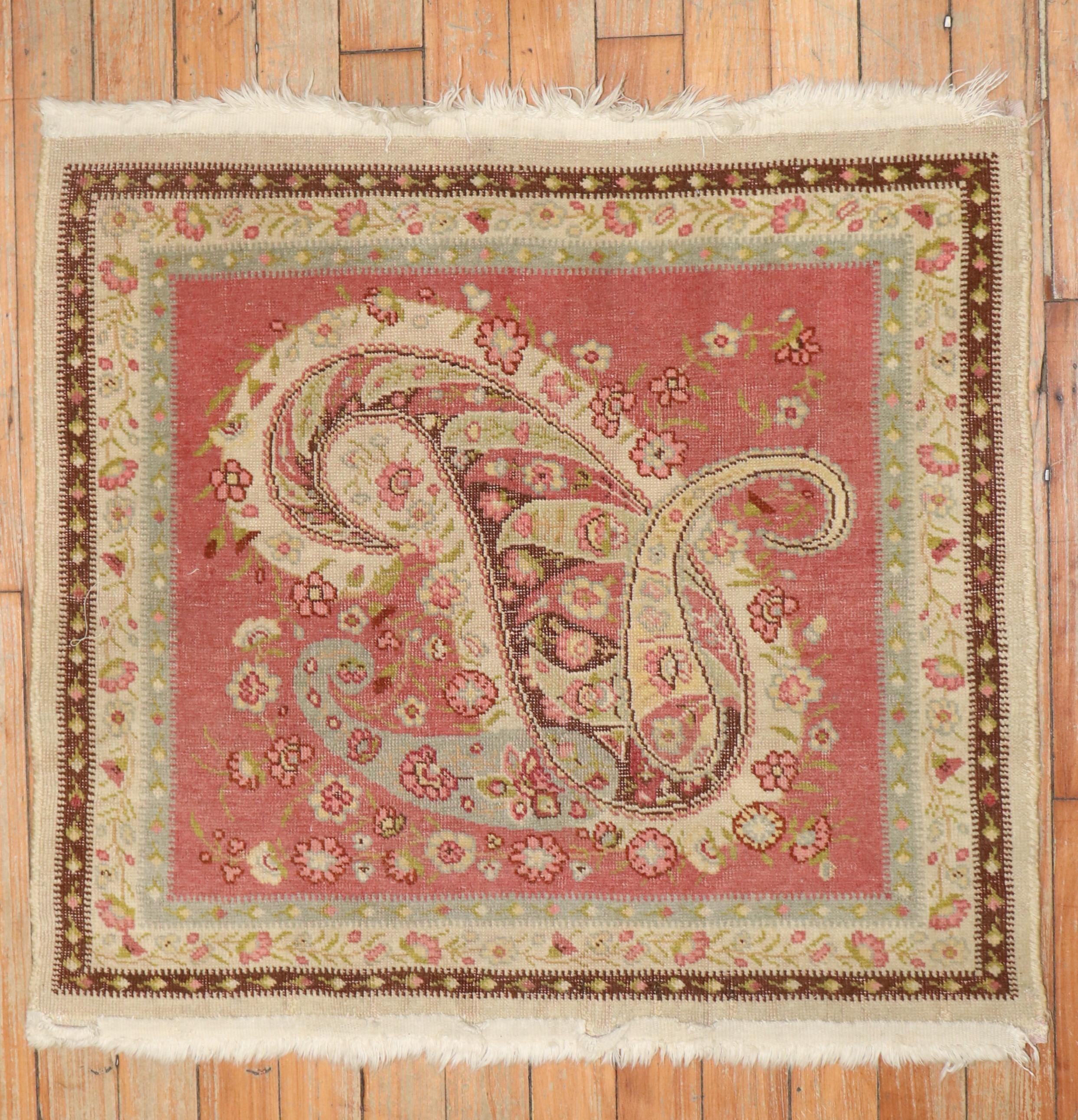 An early 20th-century floral Turkish Herekeh Rug

Measures: 2' x 2'3''.