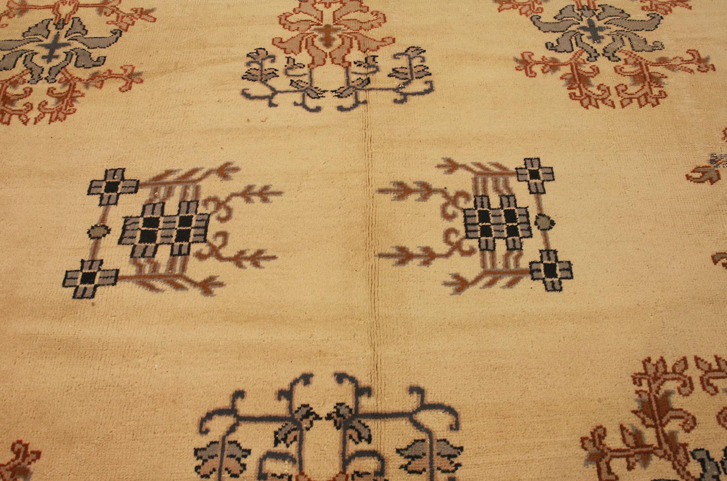 Hand-Knotted Antique Turkish Izmir Ivory Background Wool Carpet, ca. 1920 For Sale