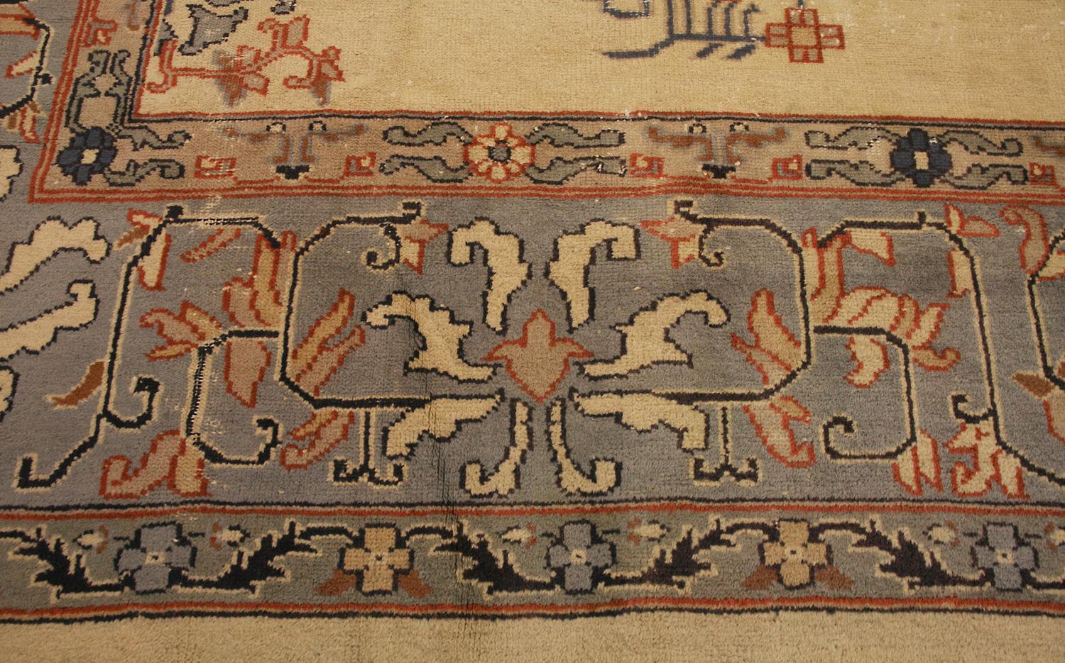 20th Century Antique Turkish Izmir Ivory Background Wool Carpet, ca. 1920 For Sale