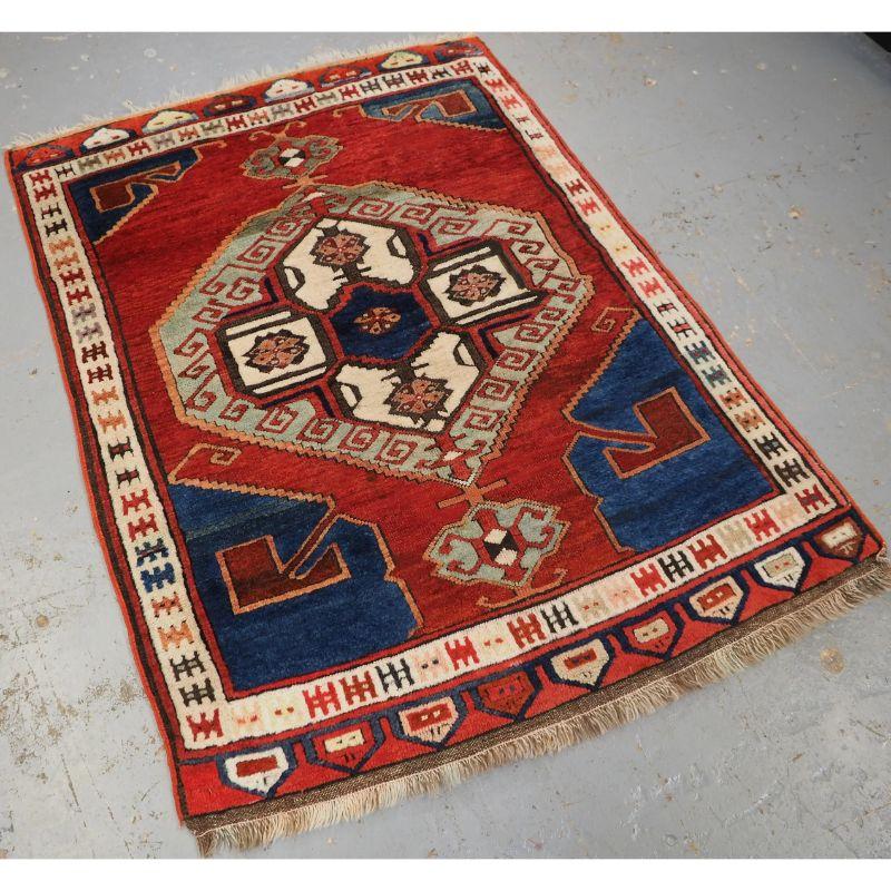 Antique Turkish Karapinar village rug of classic single medallion design.

The rug has very soft wool and a very floppy handle. The rug is beautifully drawn with superb colours through out. Rugs of this exact design have been woven from the 18th
