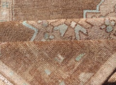Antique Turkish Kars Runner with Faded Taupe and Pale Aqua Geometric Medallions