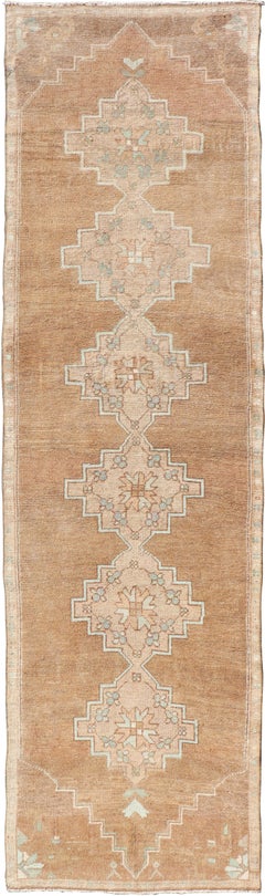 Antique Turkish Kars Runner with Faded Taupe and Pale Aqua Geometric Medallions