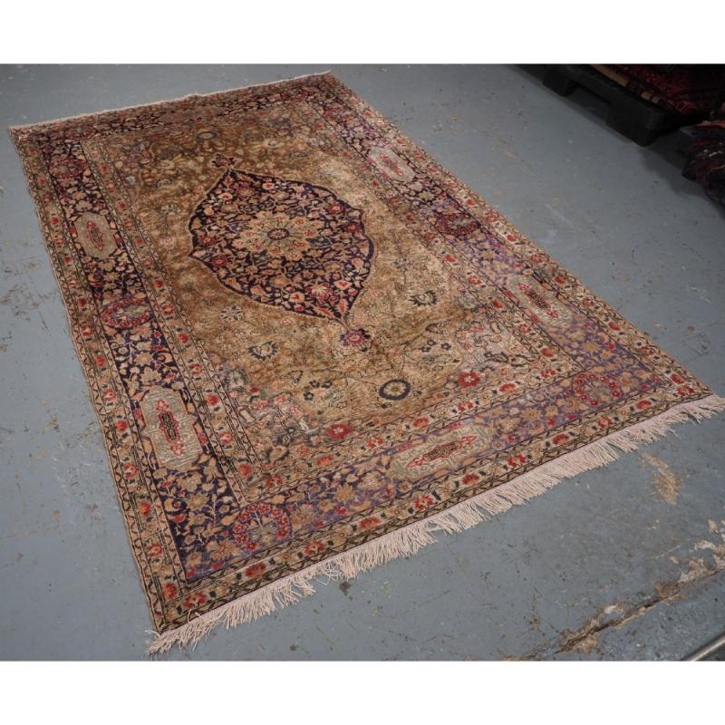 Antique Anatolian Kayseri silk rug of single medallion design
Circa 1900

The rug is of very fine weave on a silk foundation, this is a fine rug with very glossy silk, the handle is very floppy like a soft cloth The rug has a single oval medallion