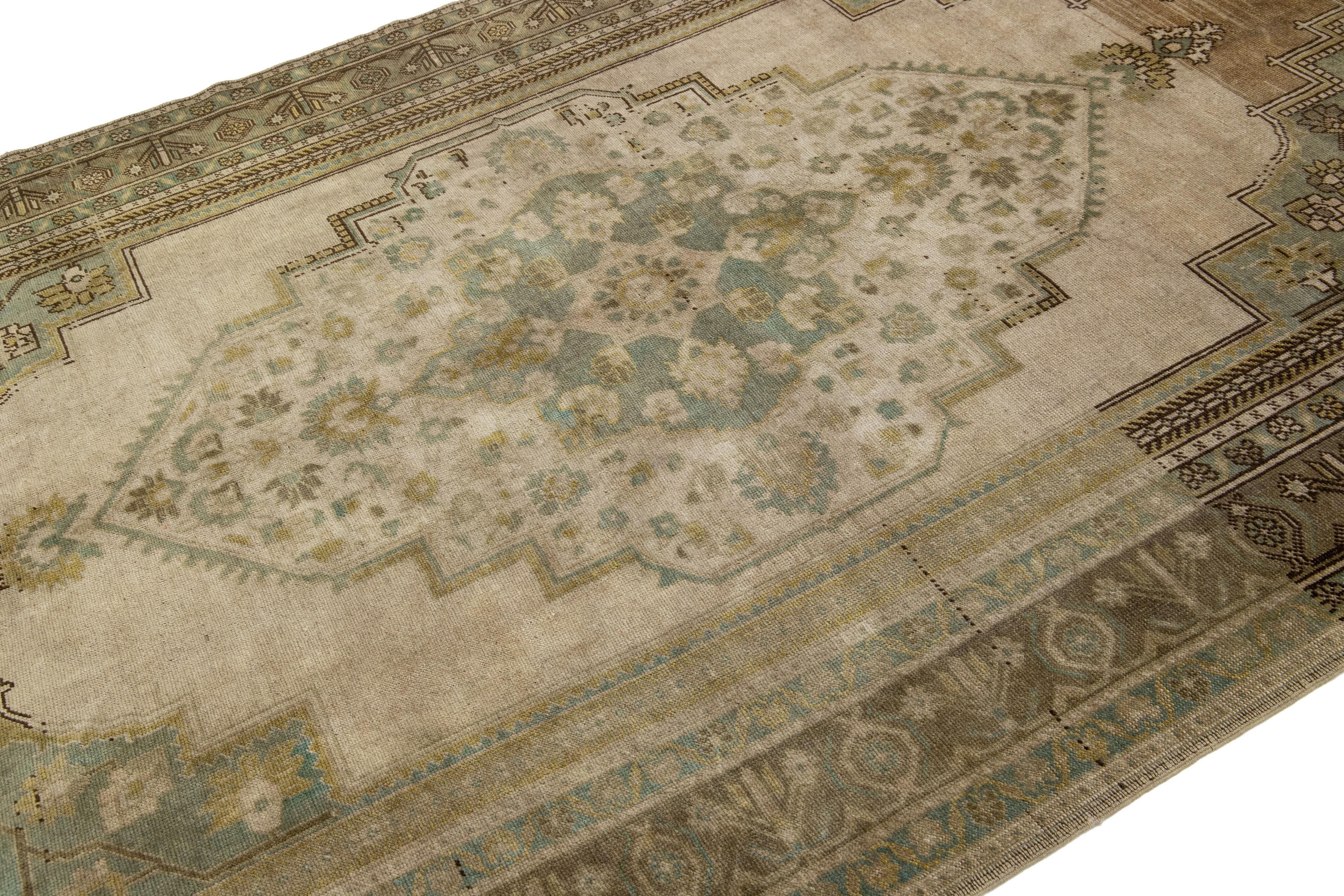 Hand-Knotted Antique Turkish Khotan Gallery Wool Rug with Medallion Motif in Light Brown For Sale