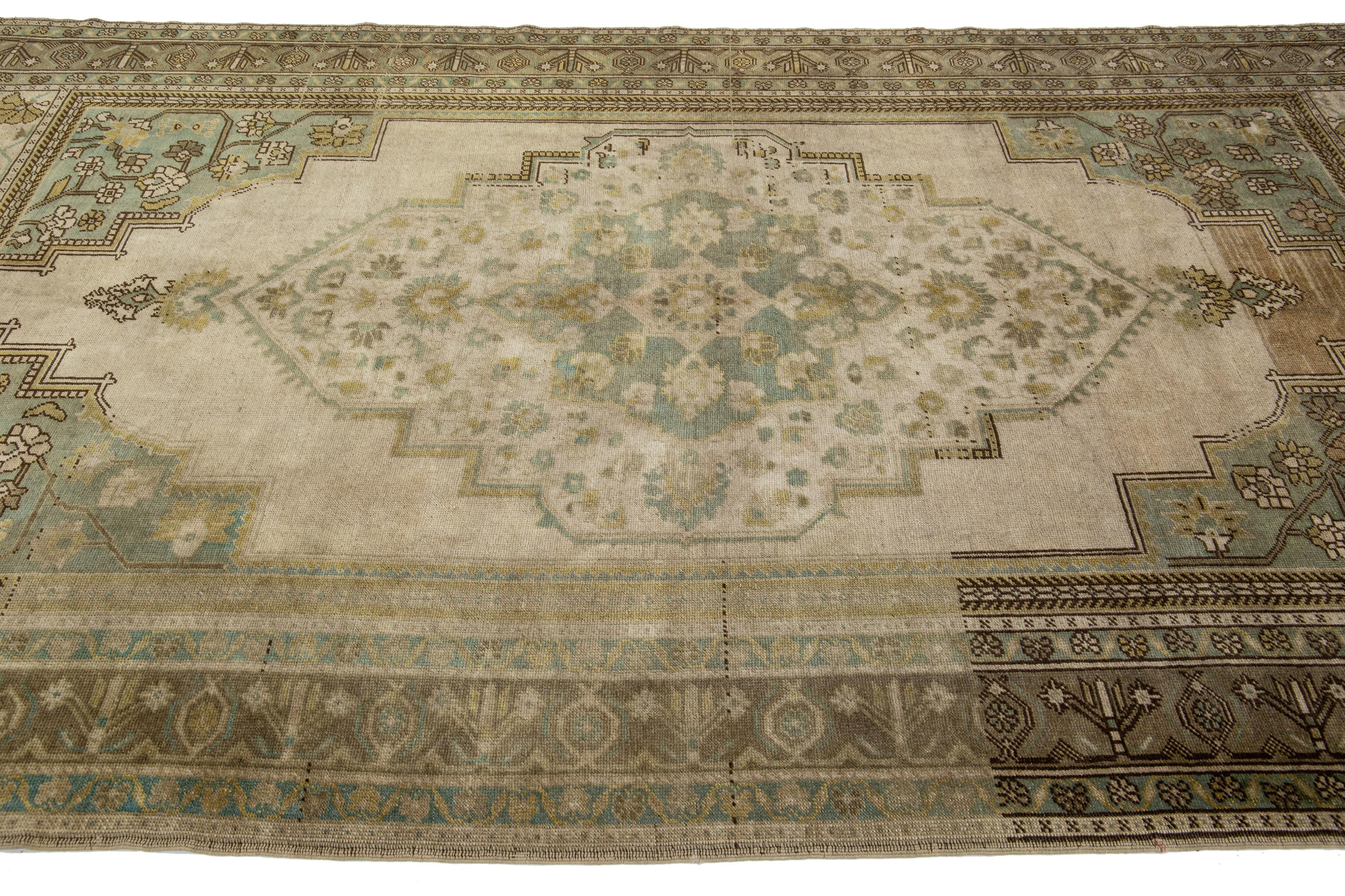 Antique Turkish Khotan Gallery Wool Rug with Medallion Motif in Light Brown In Good Condition For Sale In Norwalk, CT