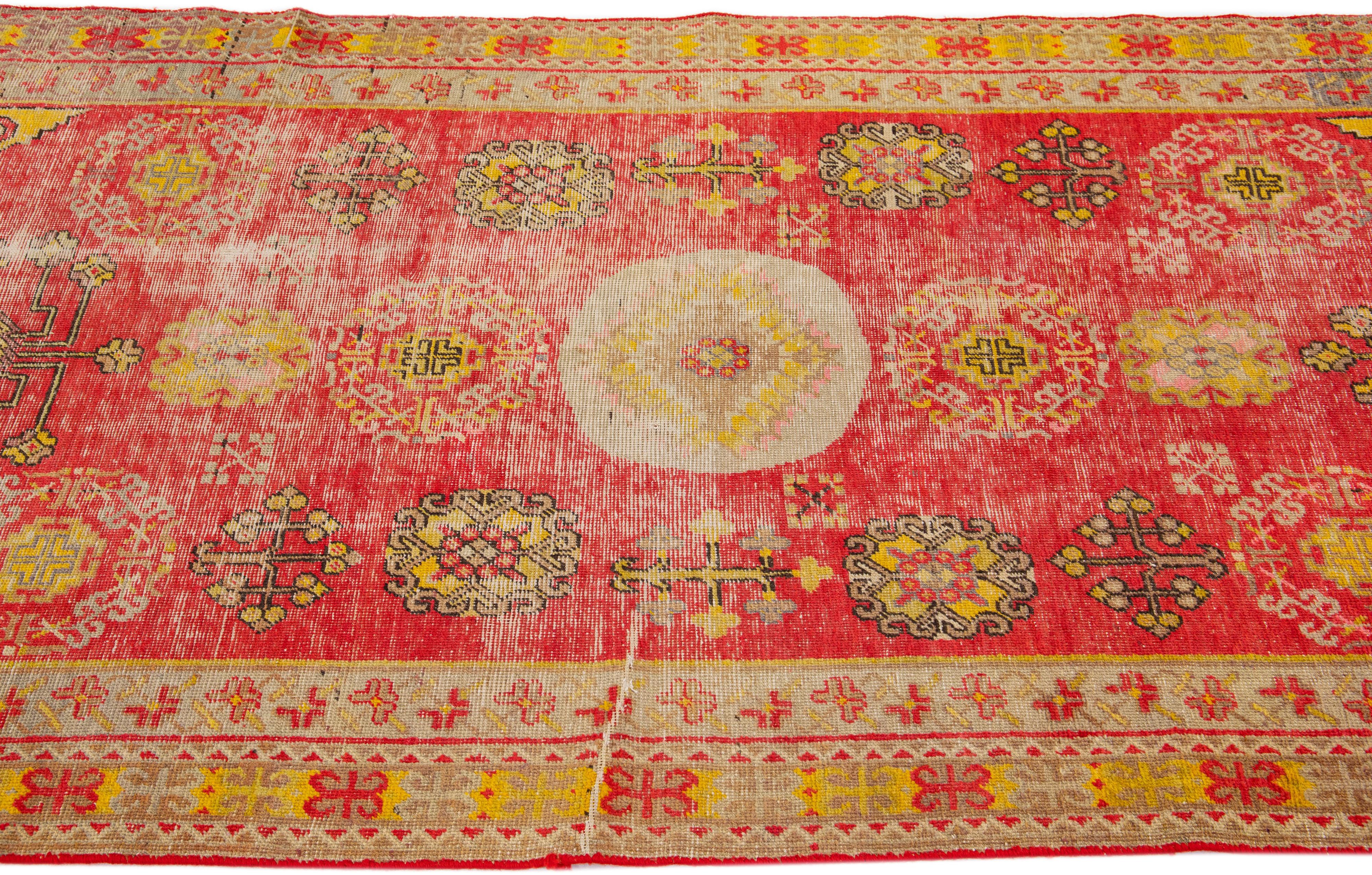 Antique Turkish Khotan Handmade Red Wool Runner In Fair Condition For Sale In Norwalk, CT