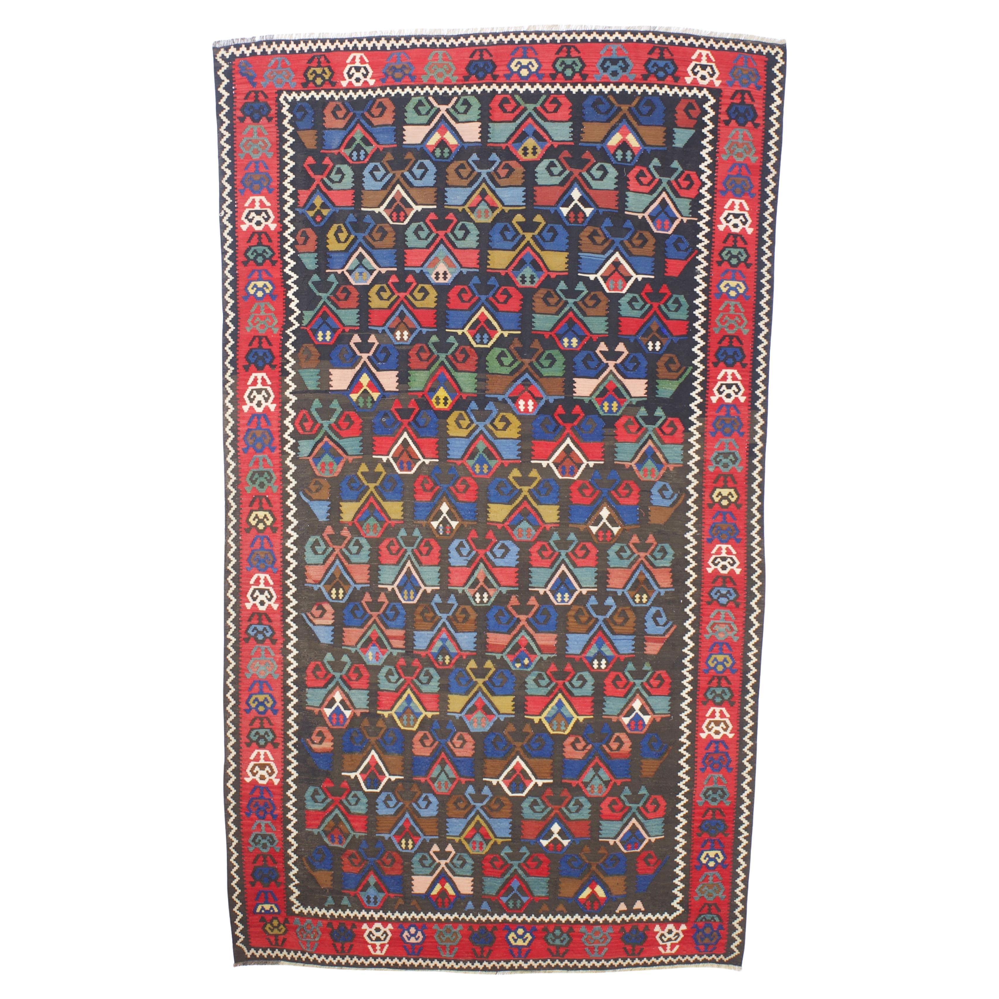Antique Turkish Kilim Rug 5'6" x 9’9"