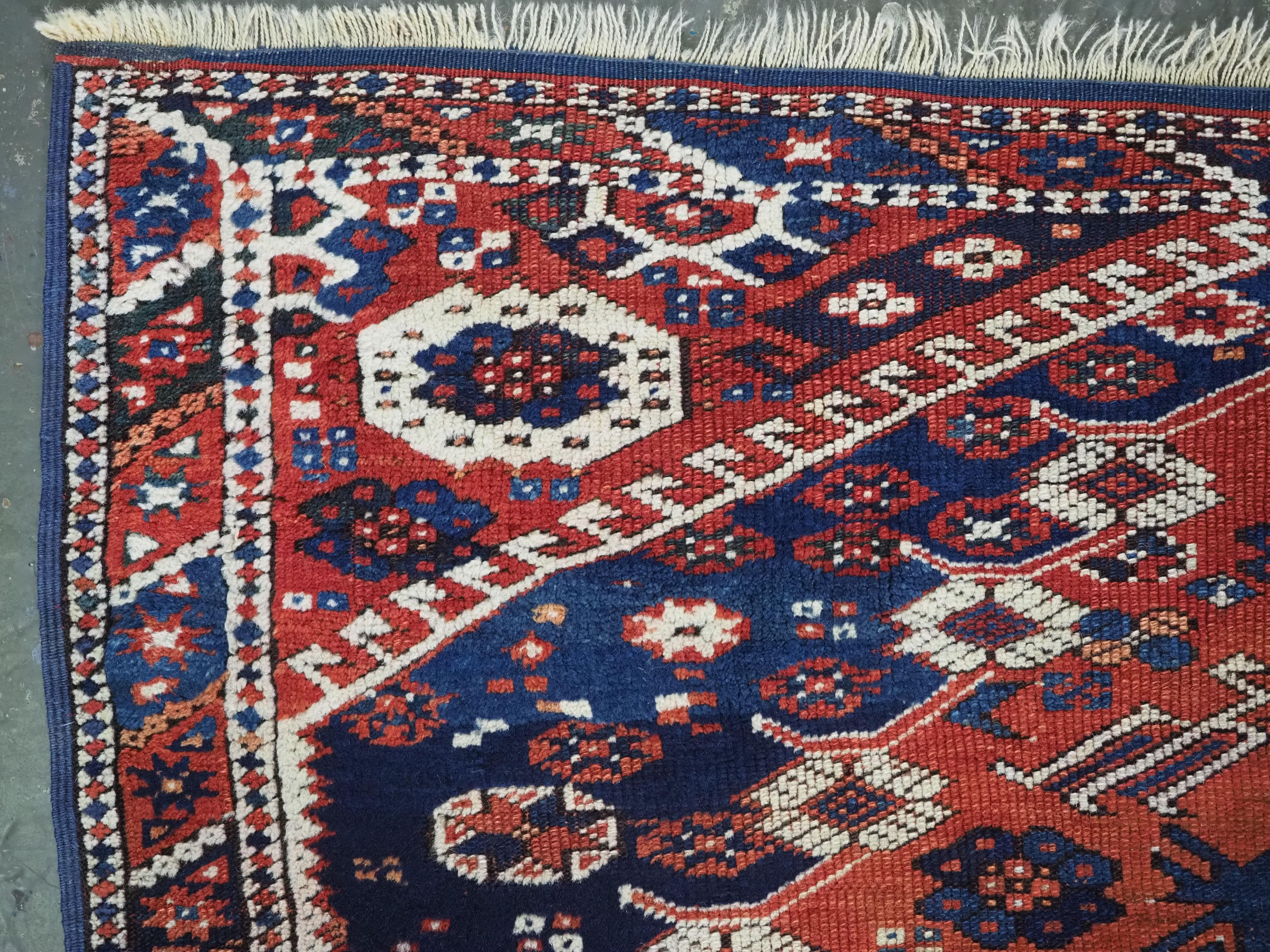 Size: 3ft 1in x 3ft 7in (95 x 108cm).

Antique Turkish Kiz Bergama rug of classic design with superb colour.

Circa 1850/70.

The rug is of a traditional design associated with these small rugs, they are considered to be 'dowry' weavings. This