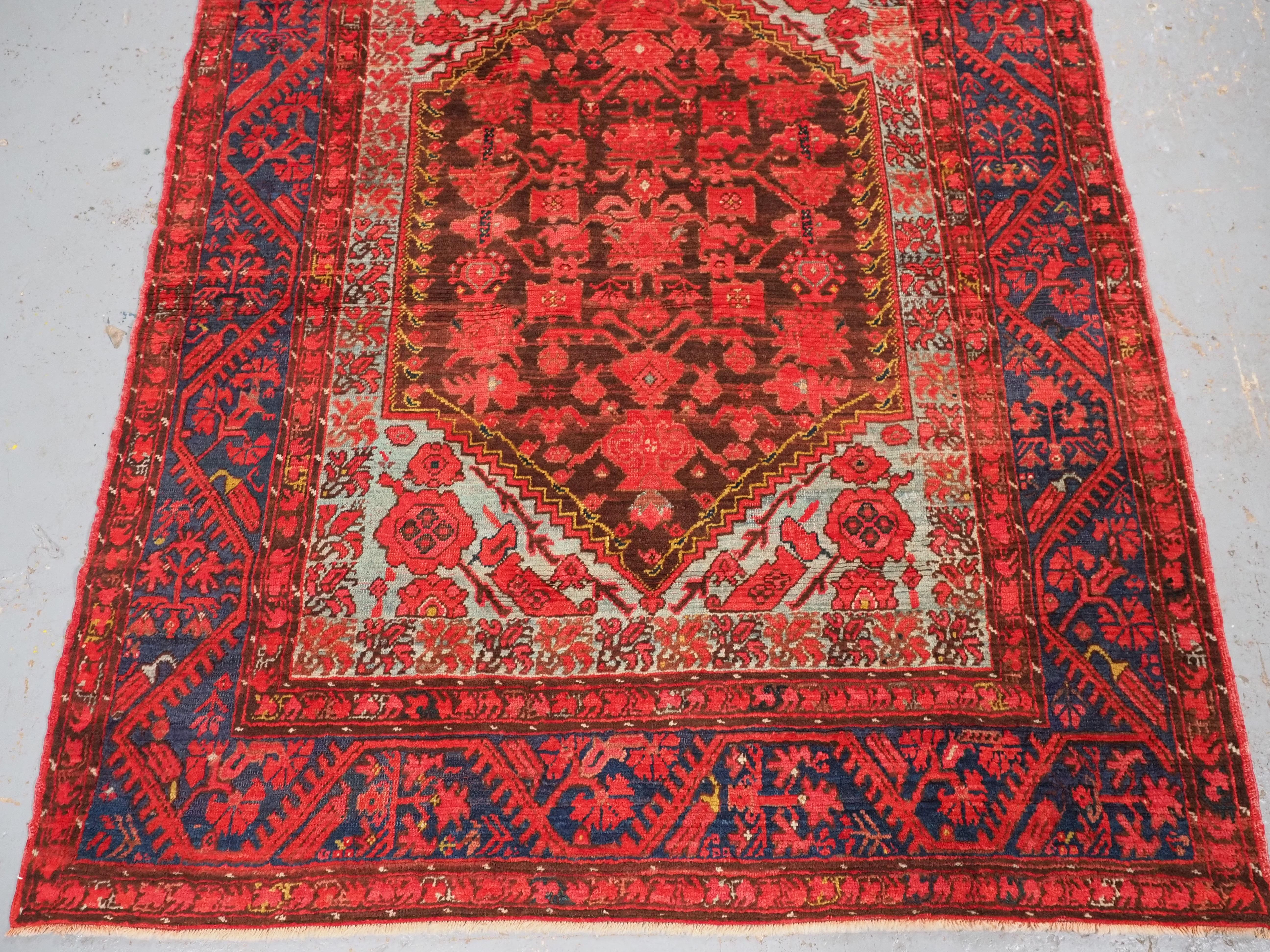 Early 20th Century  Antique Turkish Komurcu Kula rug of traditional desiign.  Circa 1900. For Sale