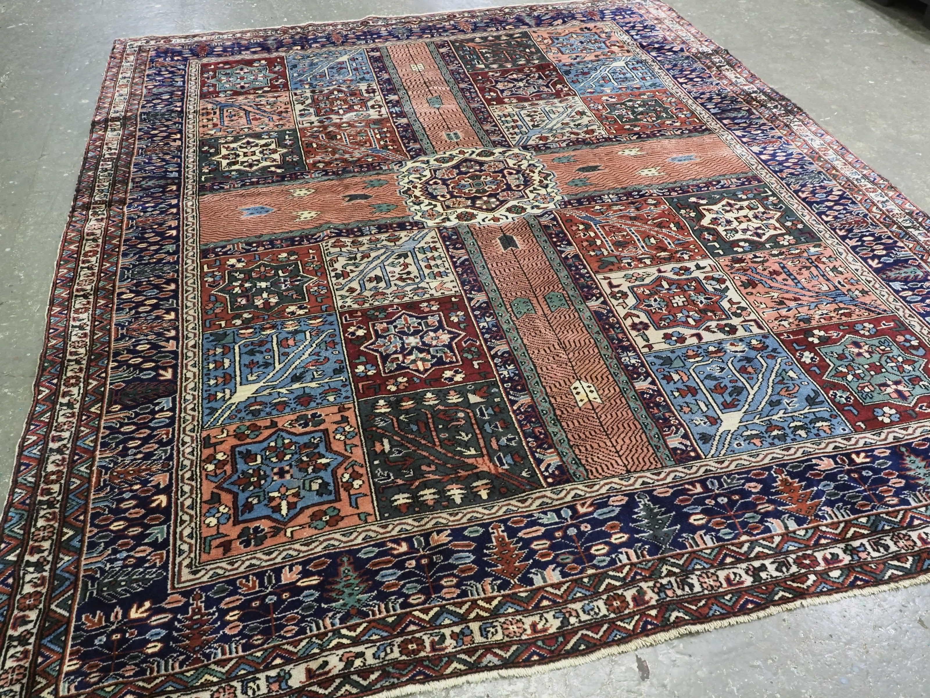 Size: 10ft 11in x 8ft 10in (332 x 268cm).

Antique Turkish Kula rug of traditional 'Persian garden' design.

Circa 1900.

This excellent carpet is drawn with a tradition garden design, with water courses and flowering plants and shrubs. The border