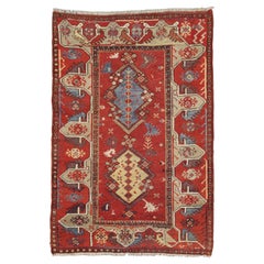 Antique Turkish Melas Large-Scale Medallions Red Background Rug, 19th Century