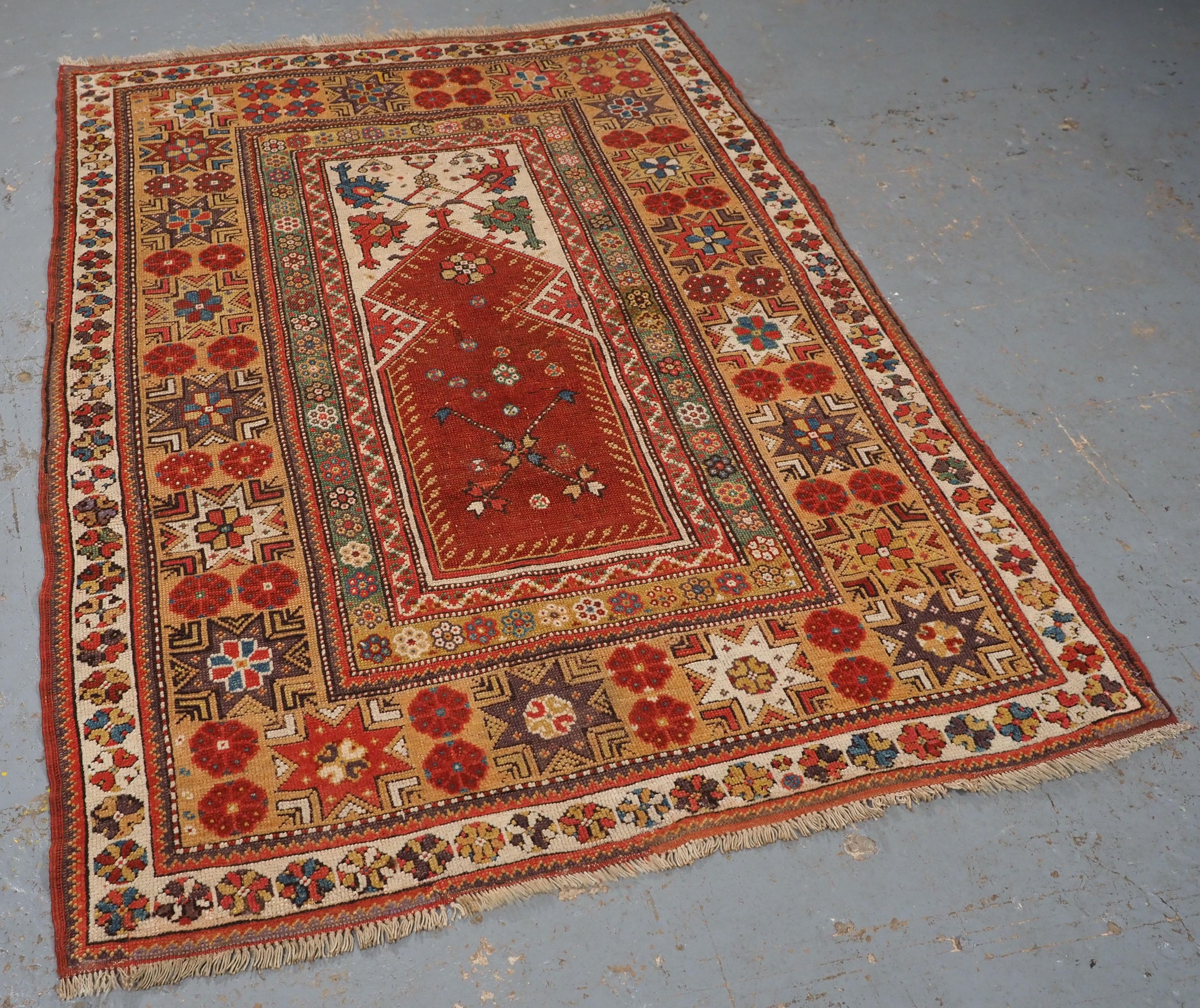 Size: 5ft 8in x 3ft 11in (173 x 120cm).

Antique Turkish Milas prayer rug of classic design with superb soft wool and good colour.

Circa 1800-1825.

The rug has very soft wool and a very floppy handle. The rug is beautifully drawn with superb