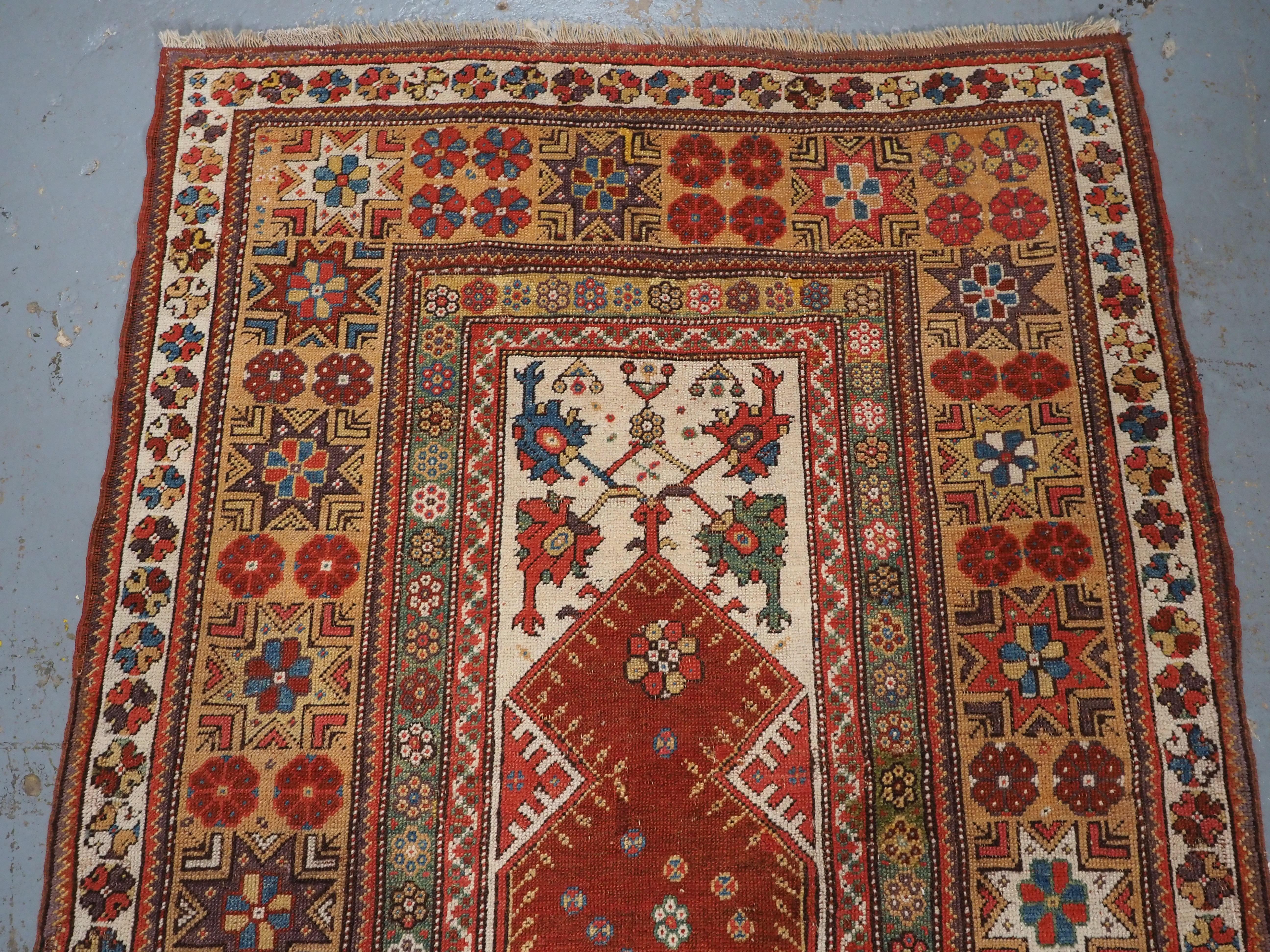 Antique Turkish Milas prayer rug of classic design, circa 1800-1825. In Good Condition For Sale In Moreton-In-Marsh, GB