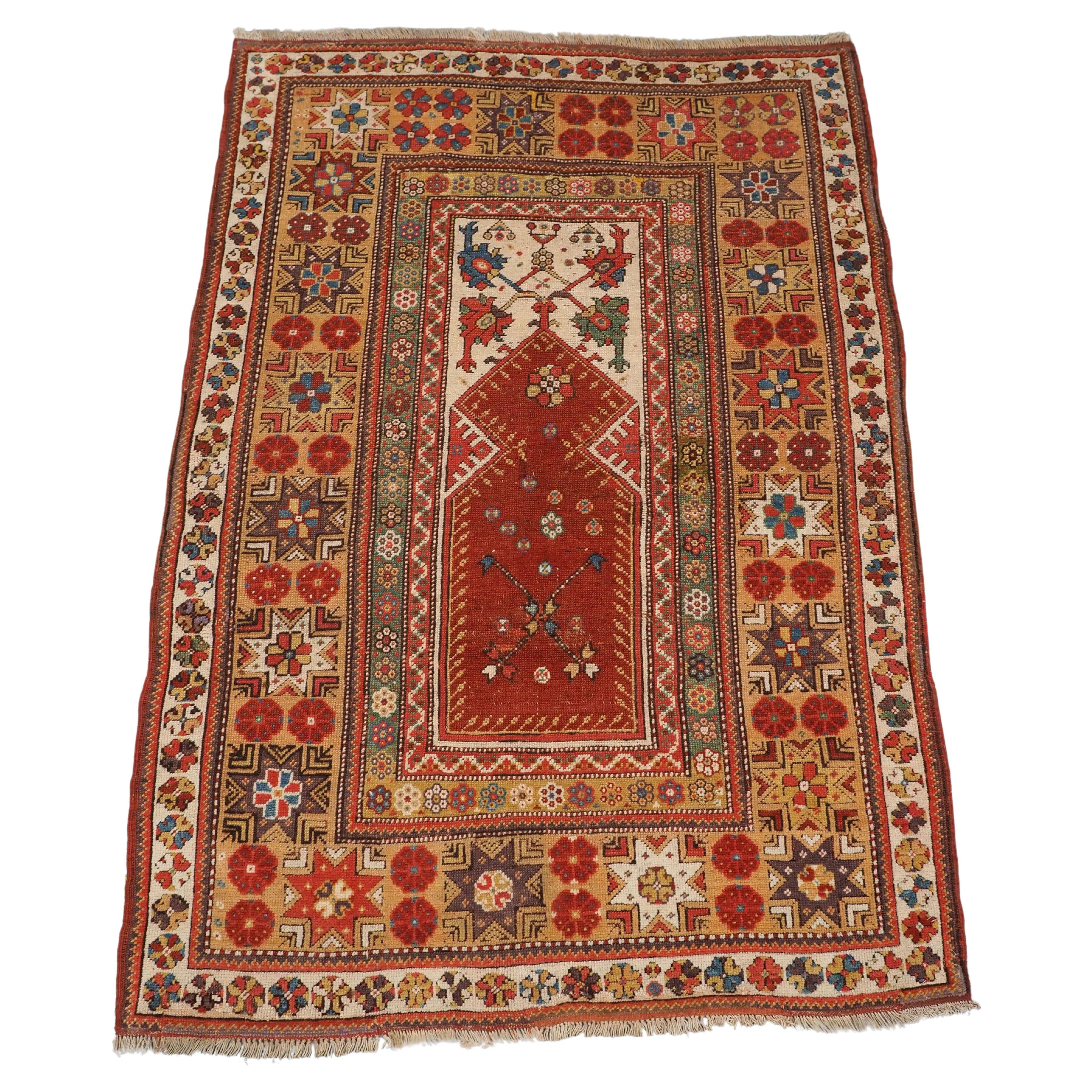 Antique Turkish Milas prayer rug of classic design, circa 1800-1825.