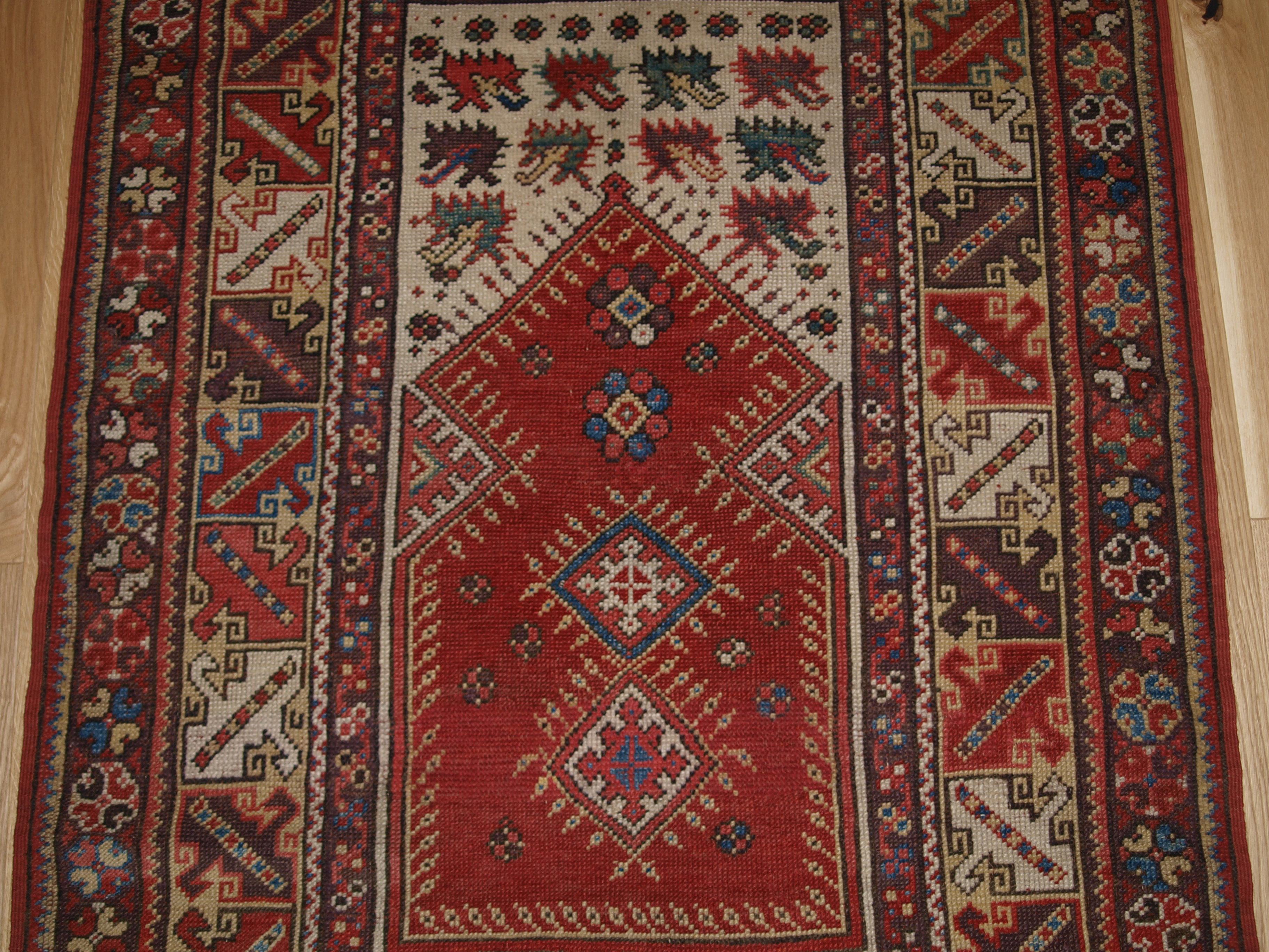 Wool Antique Turkish Milas prayer rug of classic design with superb soft wool. For Sale