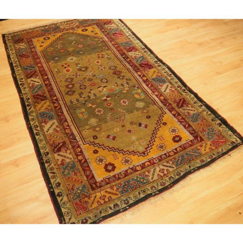 An antique Western Anatolian Milas rug of scarce design with superb soft wool and wonderful green ground.

This beautiful rug belongs to a small group of Milas rugs with this scarce design featuring a green ground. The rug has a soft colour