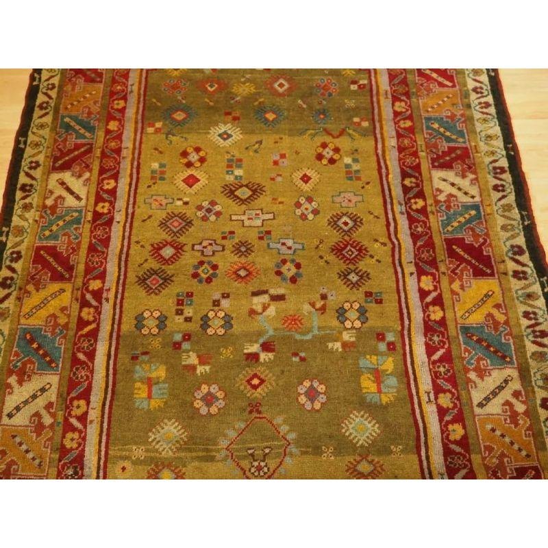 19th Century Antique Turkish Milas Rug with Scarce Green Ground, circa 1875 For Sale