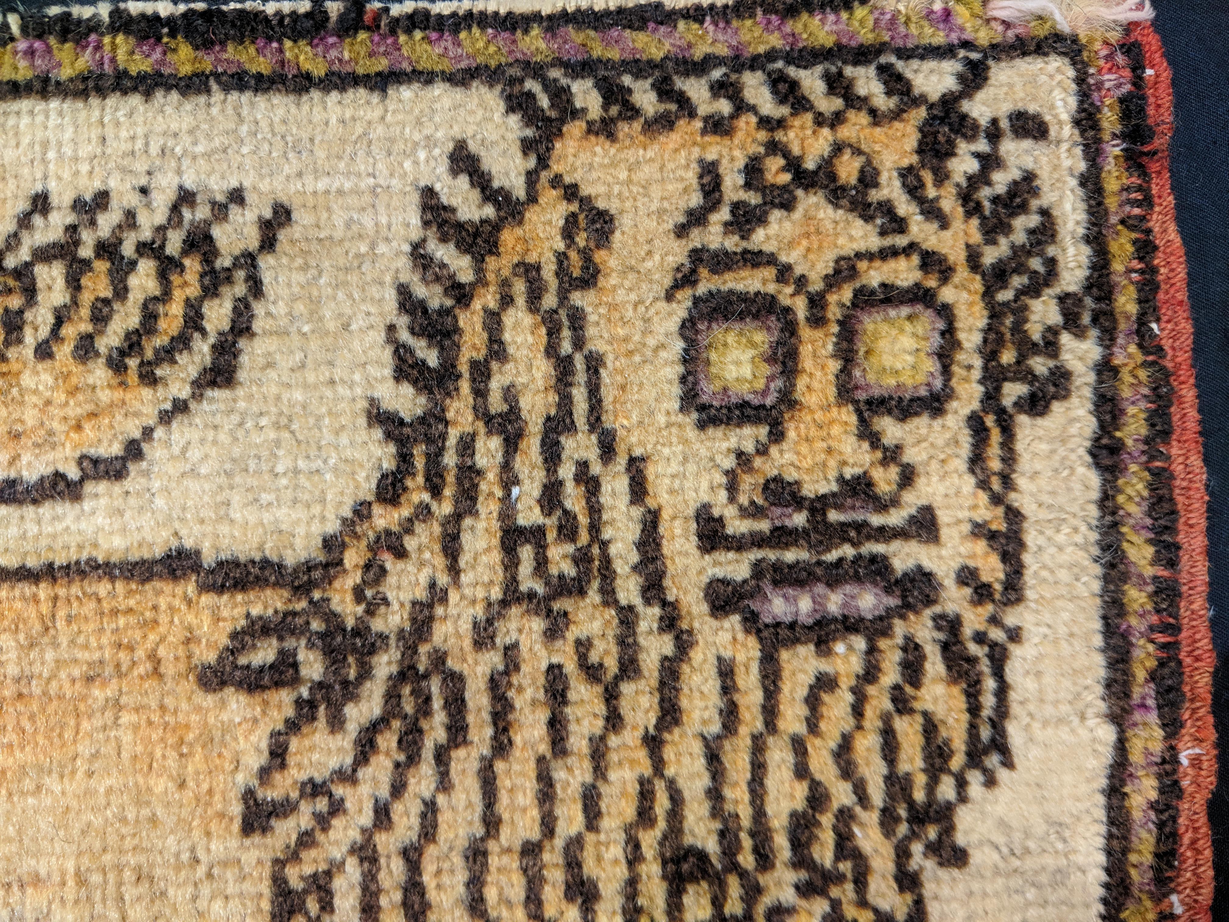 A truly unique miniature antique Turkish rug, decorated by a realistic-looking lion. Possibly commissioned for a specific occasion, it's the perfect gift for an animal-loving person, as well as for someone whose Zodiac sign is Leo.
Conserved on a