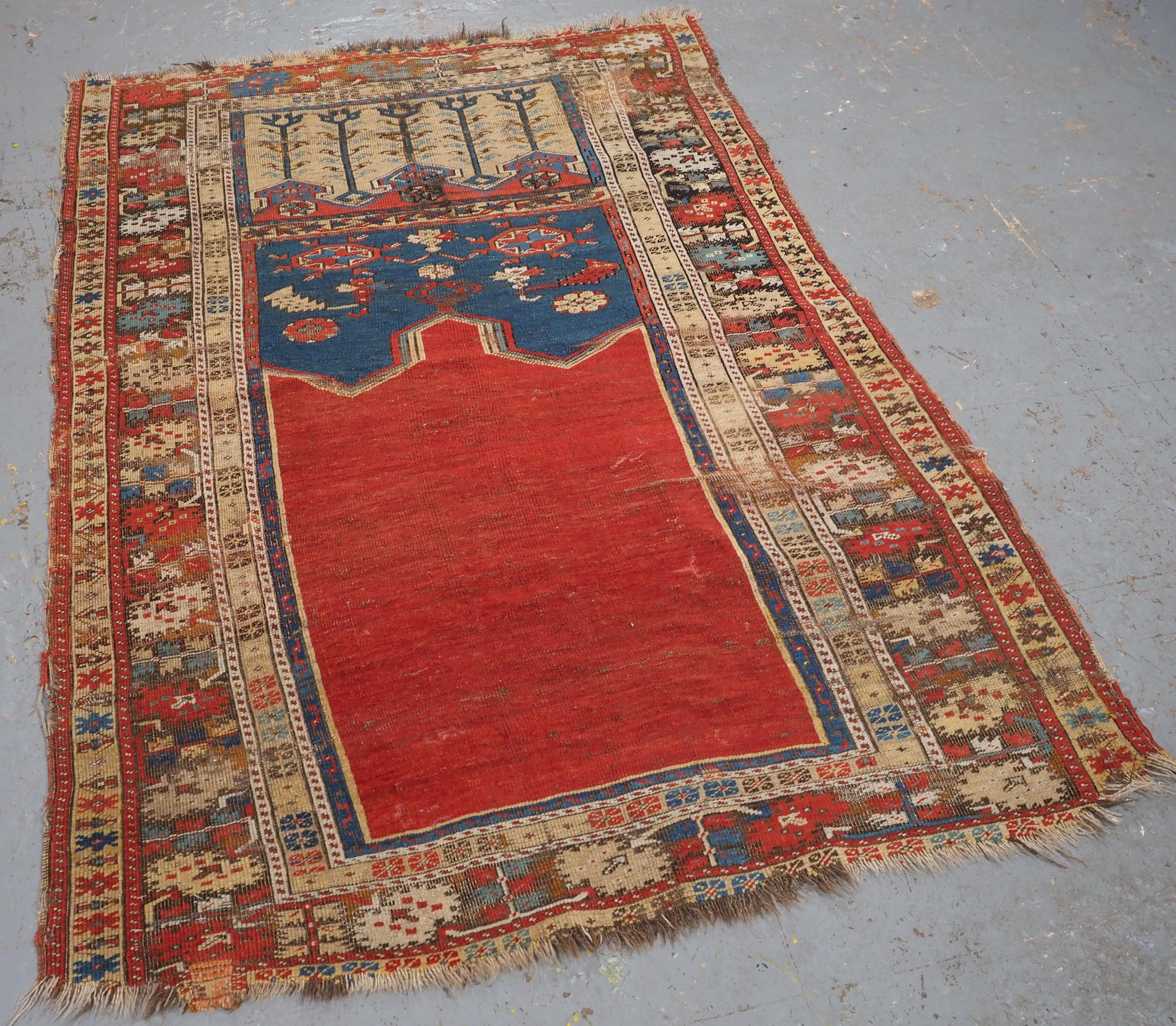 
Size: 5ft 3in x 3ft 7in (160 x 110cm).

Antique Turkish Ottoman Ladik prayer rug, a superb early example in original condition.

Circa 1800.

This is a beautifully drawn early rug with superb colour, the drawing of the border is outstanding. The