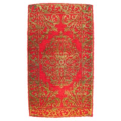 Antiker türkischer Ottomane-Teppich mit Blumenmedaillon in Rot und Grün
