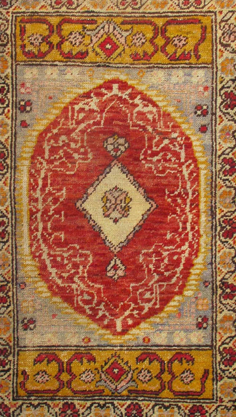 Antique Turkish Ottoman Rug with Medallion and Flowers in Yellow, Red, Gray For Sale at 1stDibs