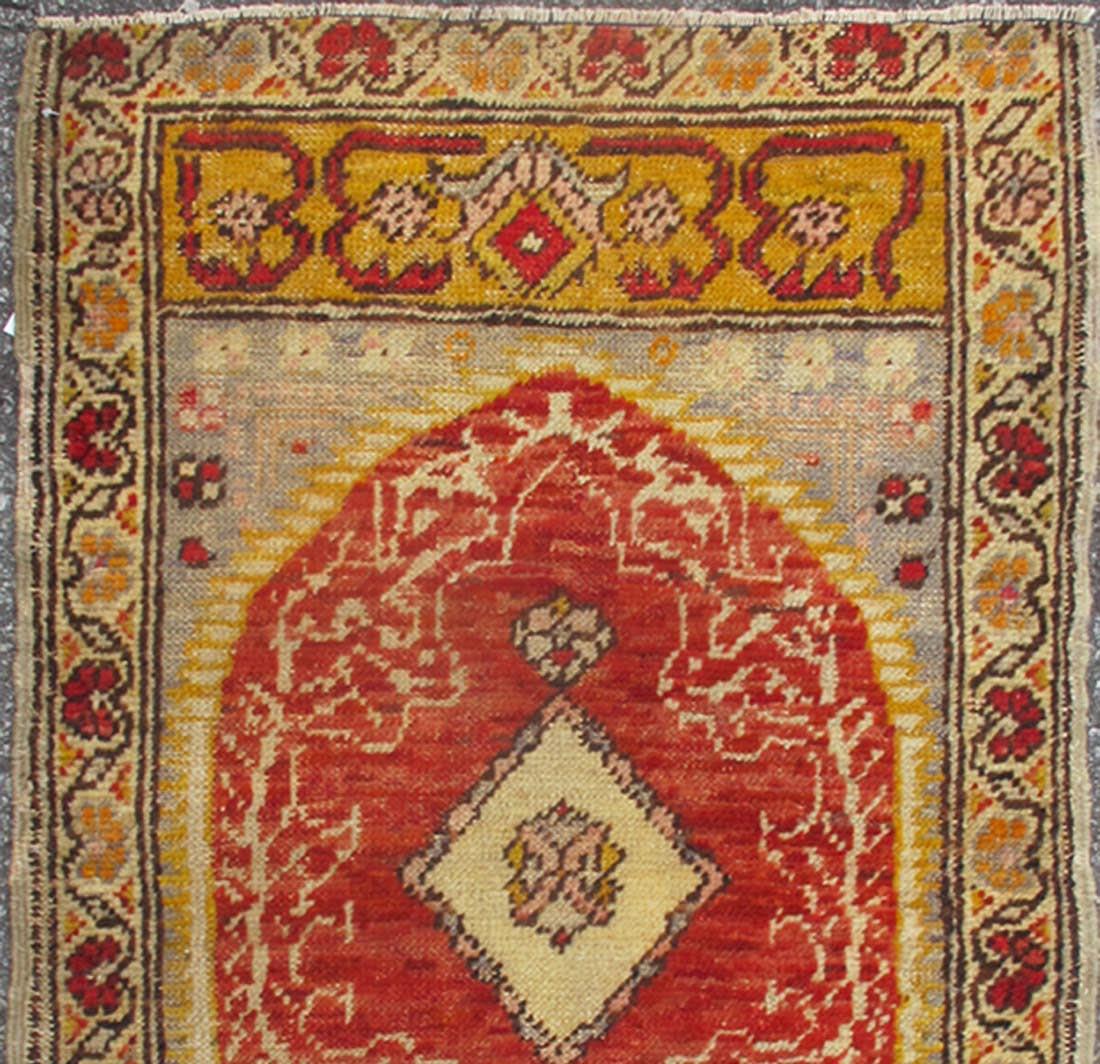 Hand-Knotted Antique Turkish Ottoman Rug with Medallion and Flowers in Yellow, Red, Gray For Sale
