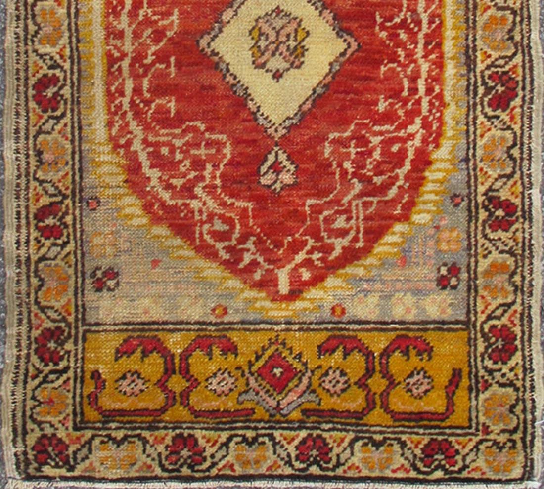 Antique Turkish Ottoman Rug with Medallion and Flowers in Yellow, Red, Gray In Good Condition For Sale In Atlanta, GA