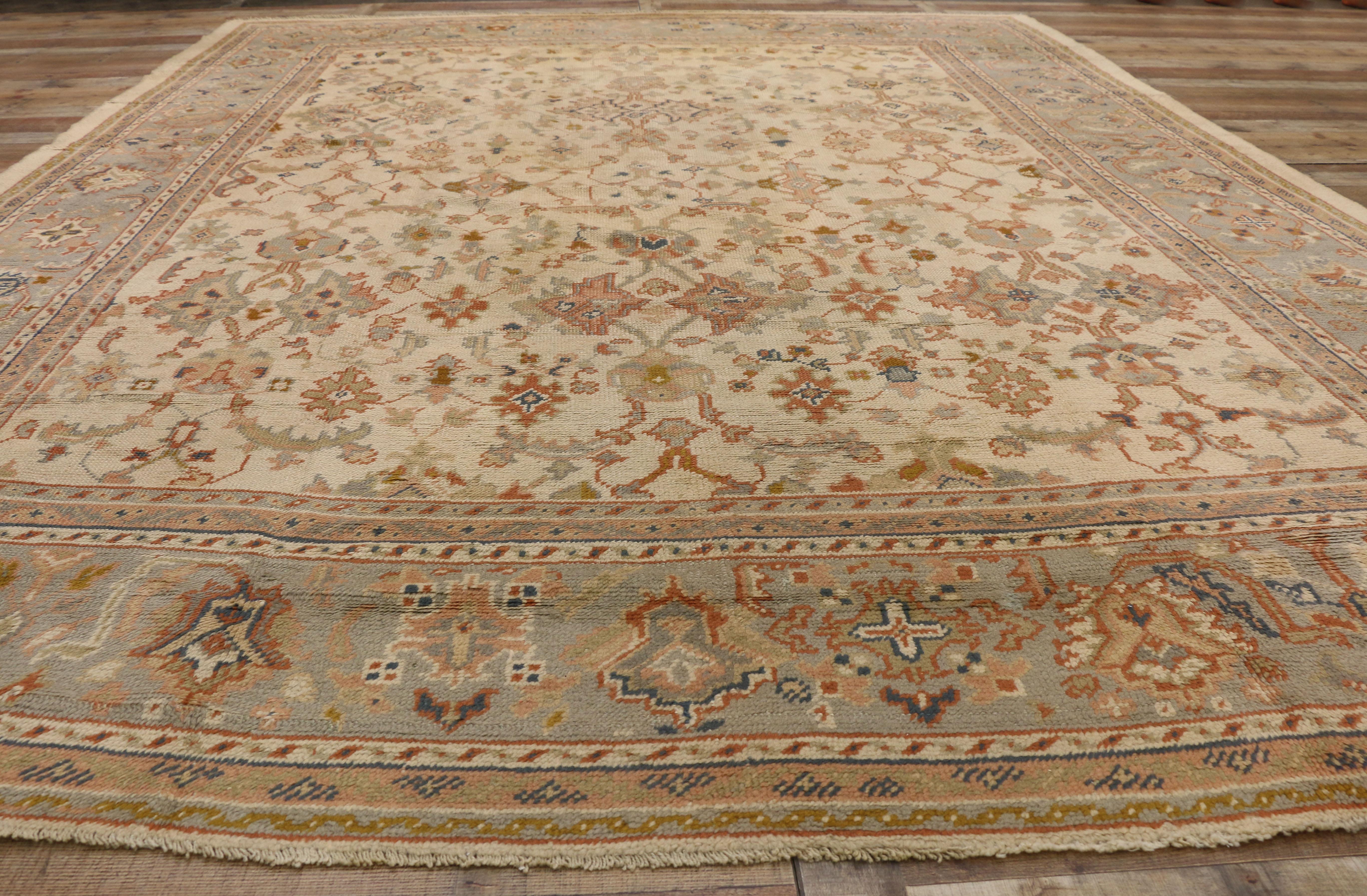 20th Century Antique Turkish Oushak Area Rug with French Provincial Style For Sale