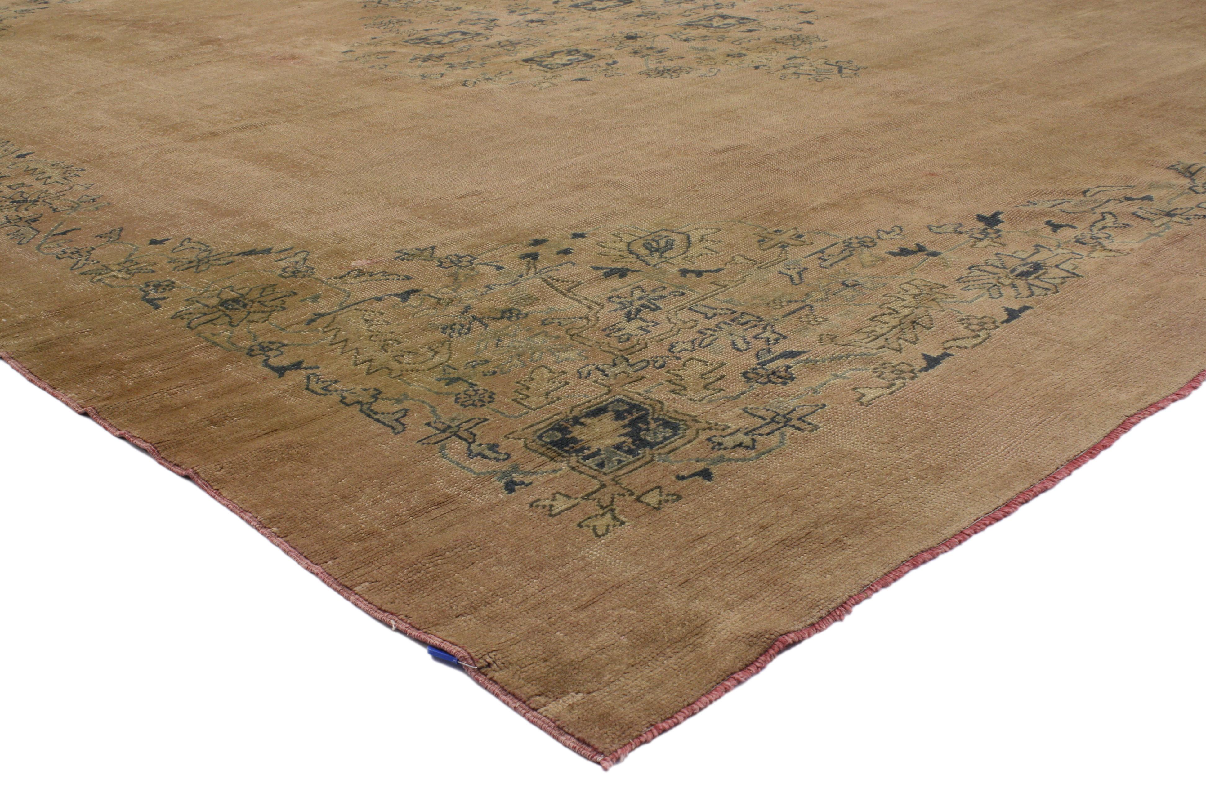 50214 Antique Turkish Oushak Area rug with Rustic Romantic Georgian style. A beautiful combination of rustic pink hues and soft blues in this hand-knotted wool antique Turkish Oushak rug create a delicate and effortlessly romantic ambiance. It
