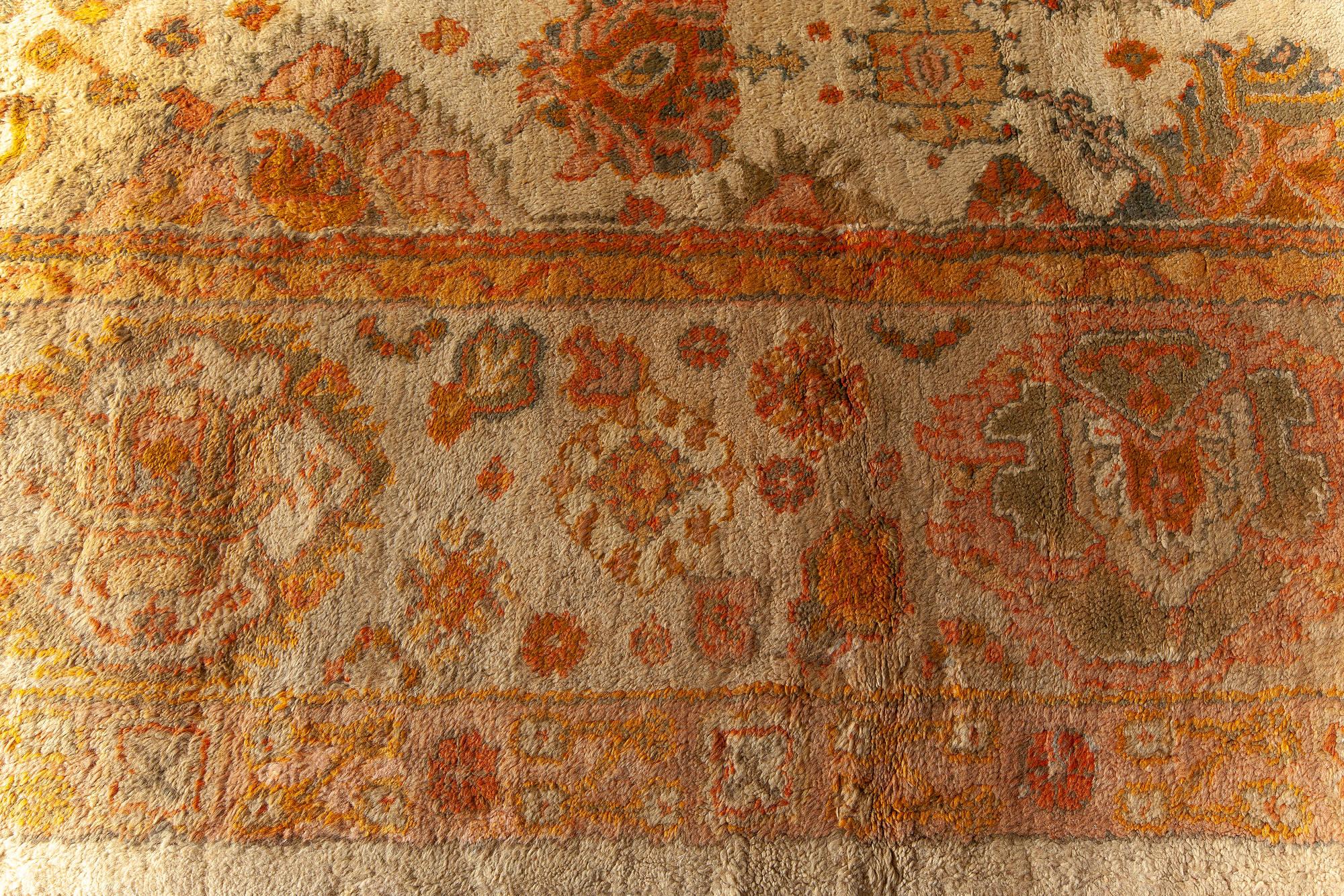20th Century Antique Turkish Oushak Botanic Handmade Wool Rug For Sale