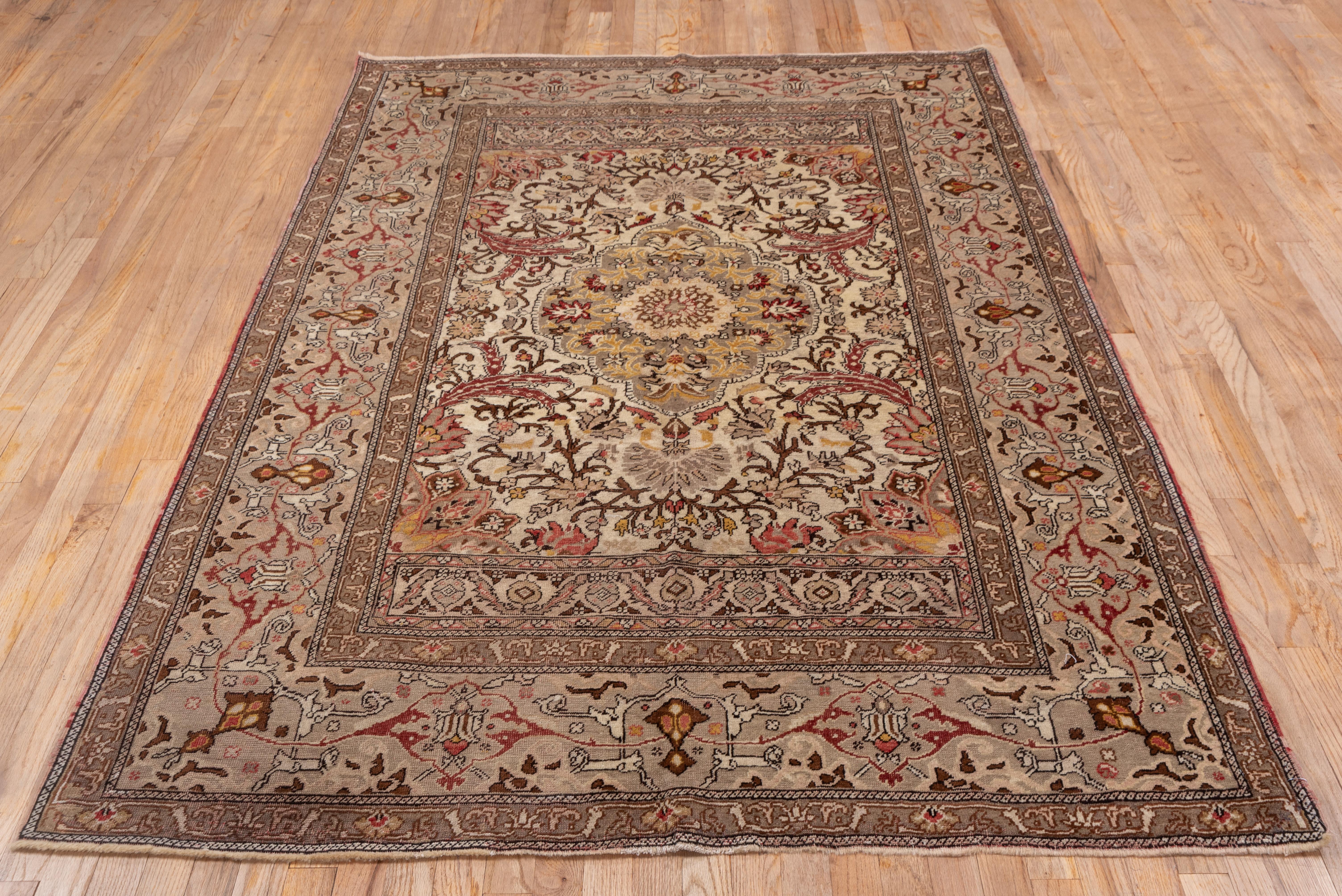 Antique Turkish Oushak Carpet, Brown Borders, Ivory Field, Medallion In Good Condition In New York, NY