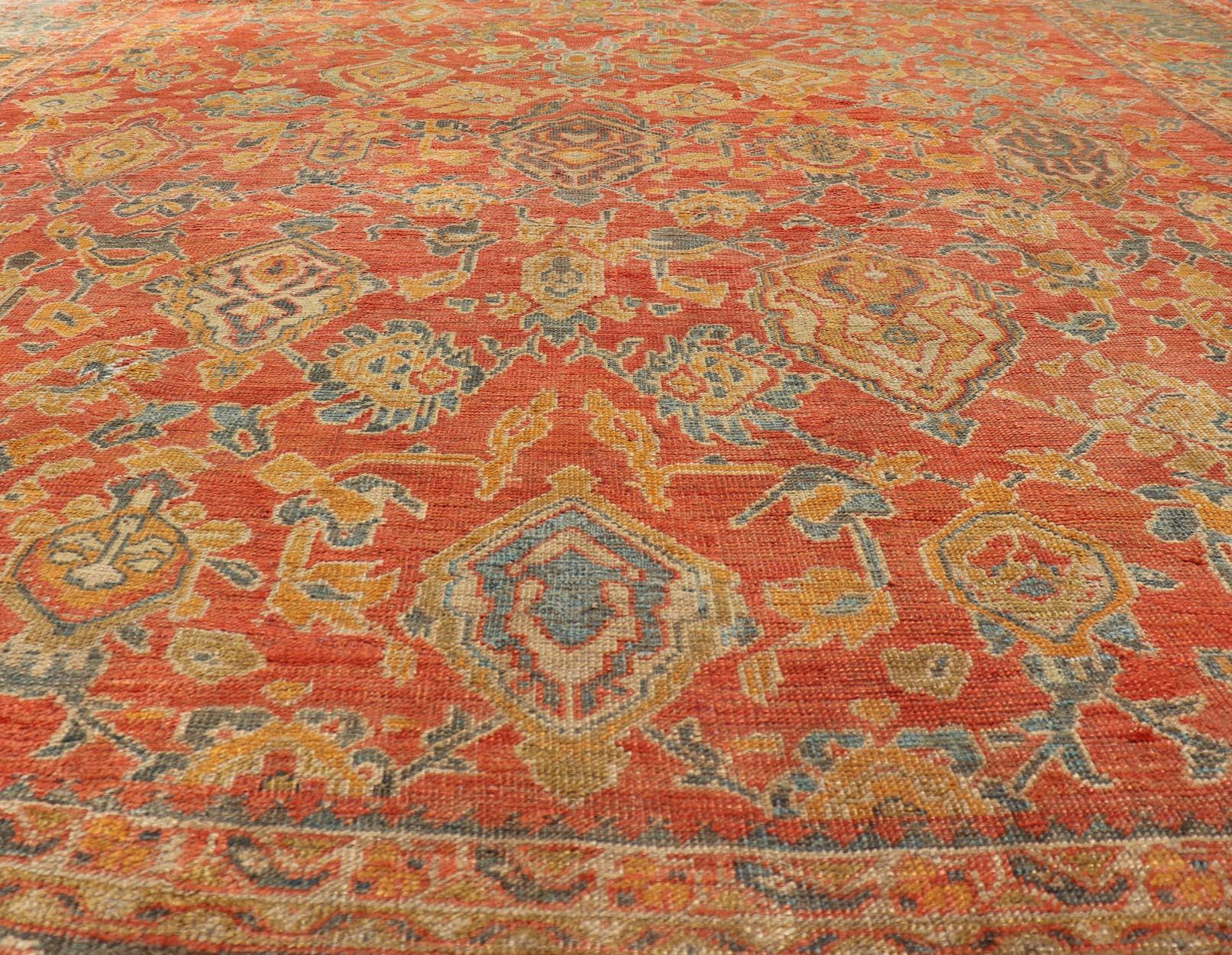 Antique Turkish Oushak Rug in Terracotta With All-Over Flower, Leaves and Vines. Keivan Woven Arts / rug M14-0401, country of origin / type: Turkey / Oushak, circa late 19th century

Measures: 12'1 x 14'4.

Variation of orange/terracotta and soft